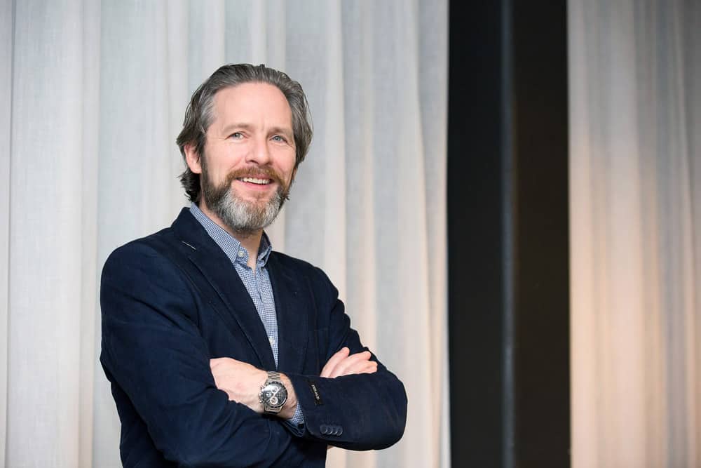 Image of the founder looking at us