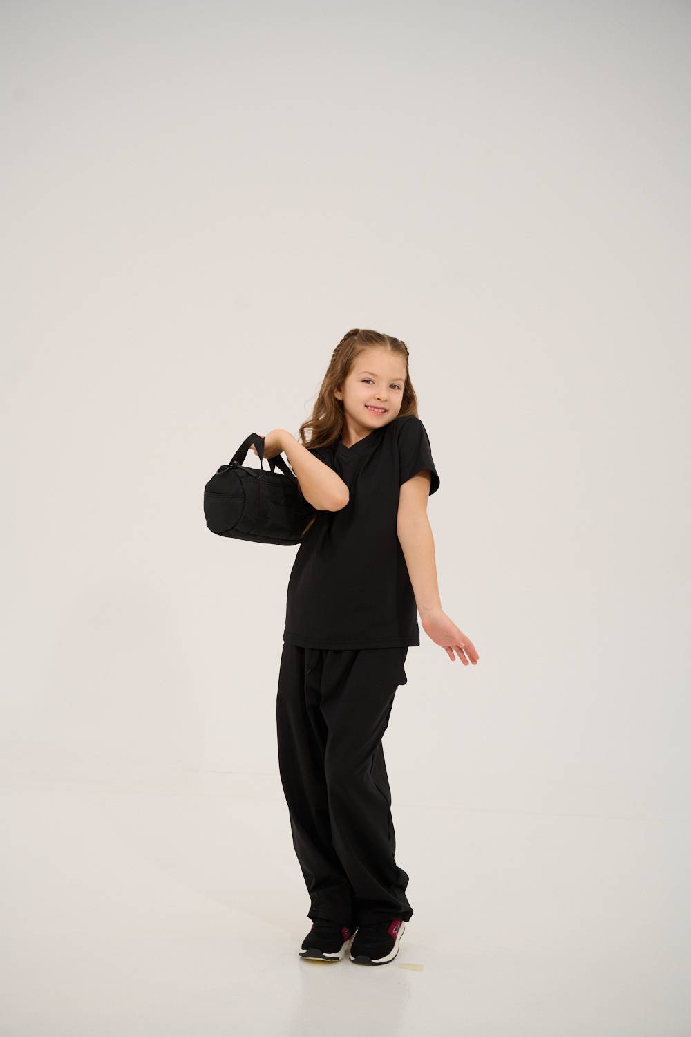 Friends laughing and posing inside a car