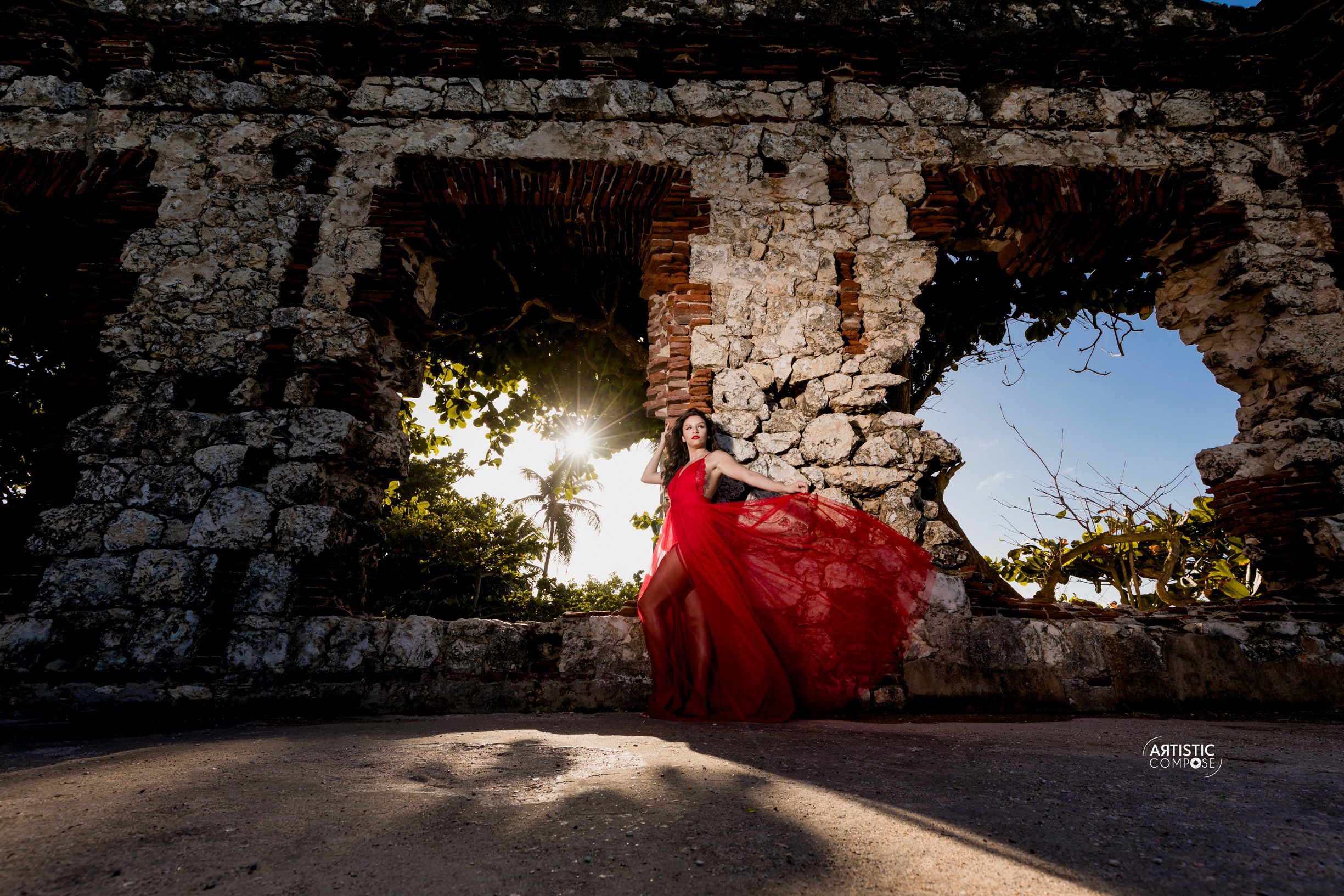 Bride in white dress walking on street, blurred motorcycle passing