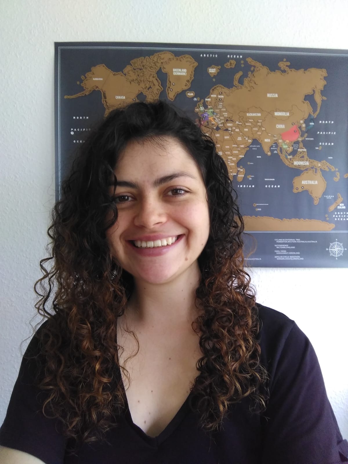 A portrait of a young woman smiling