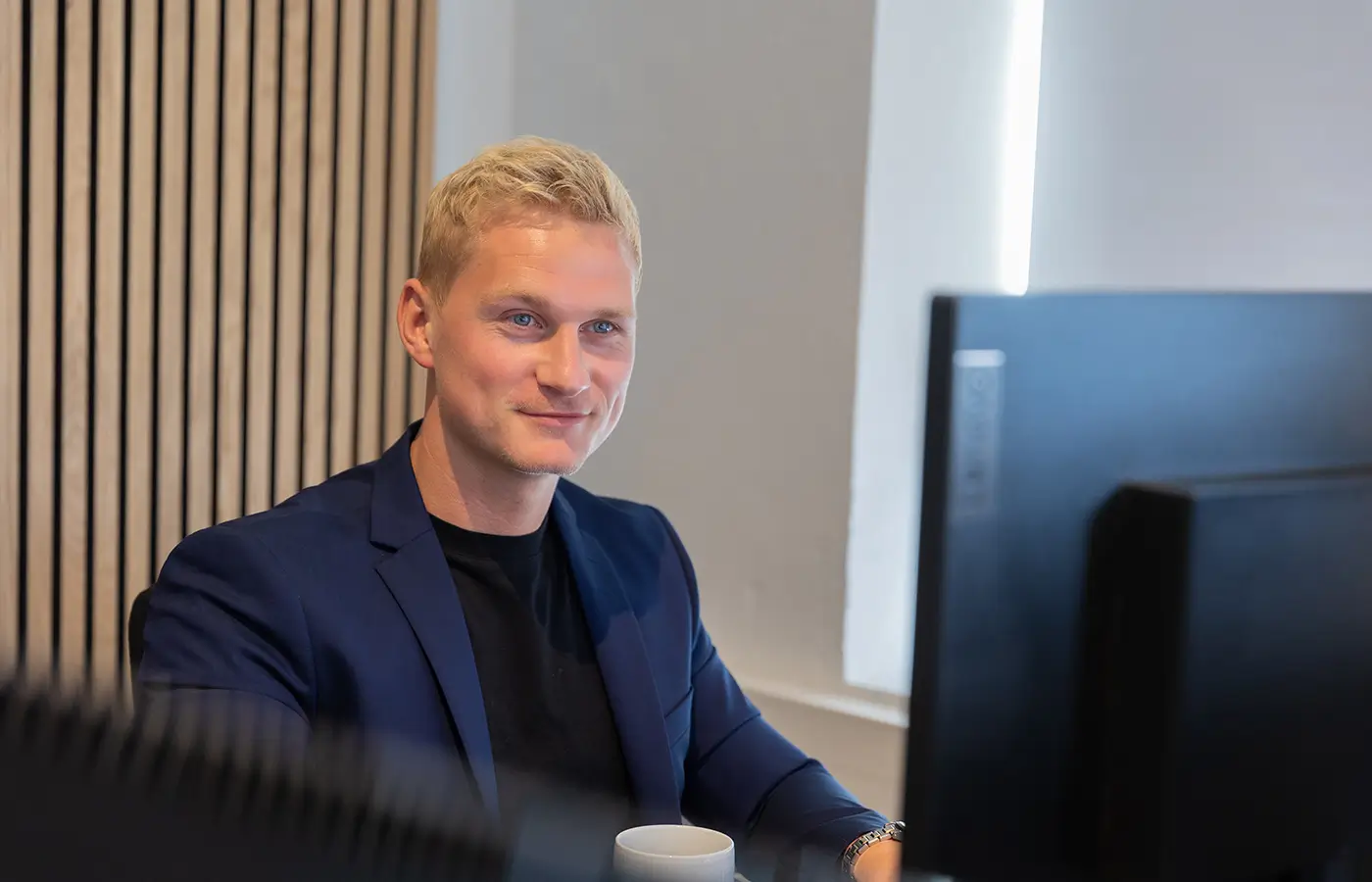 Anders Pedersen, co-founder of The Marketing Agency, at his desk