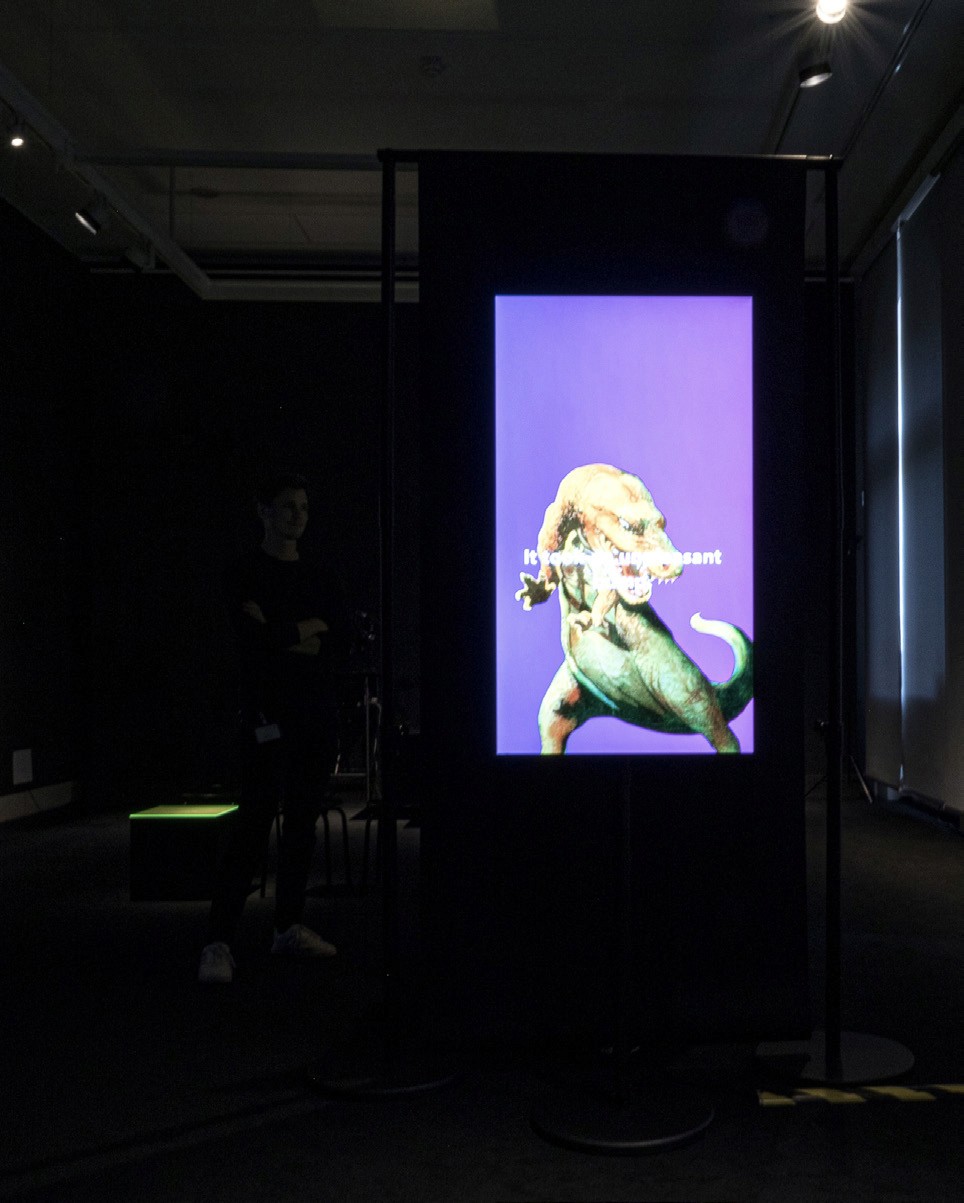 A poster by Discount Designer is projected onto a screen in an exhibition at the Berlin Museum of Communication