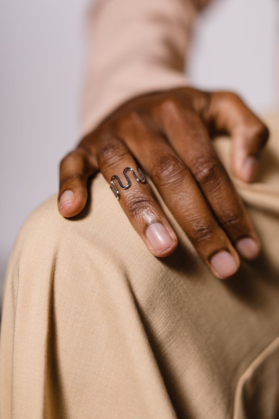 Close up on a man hand showing a ring