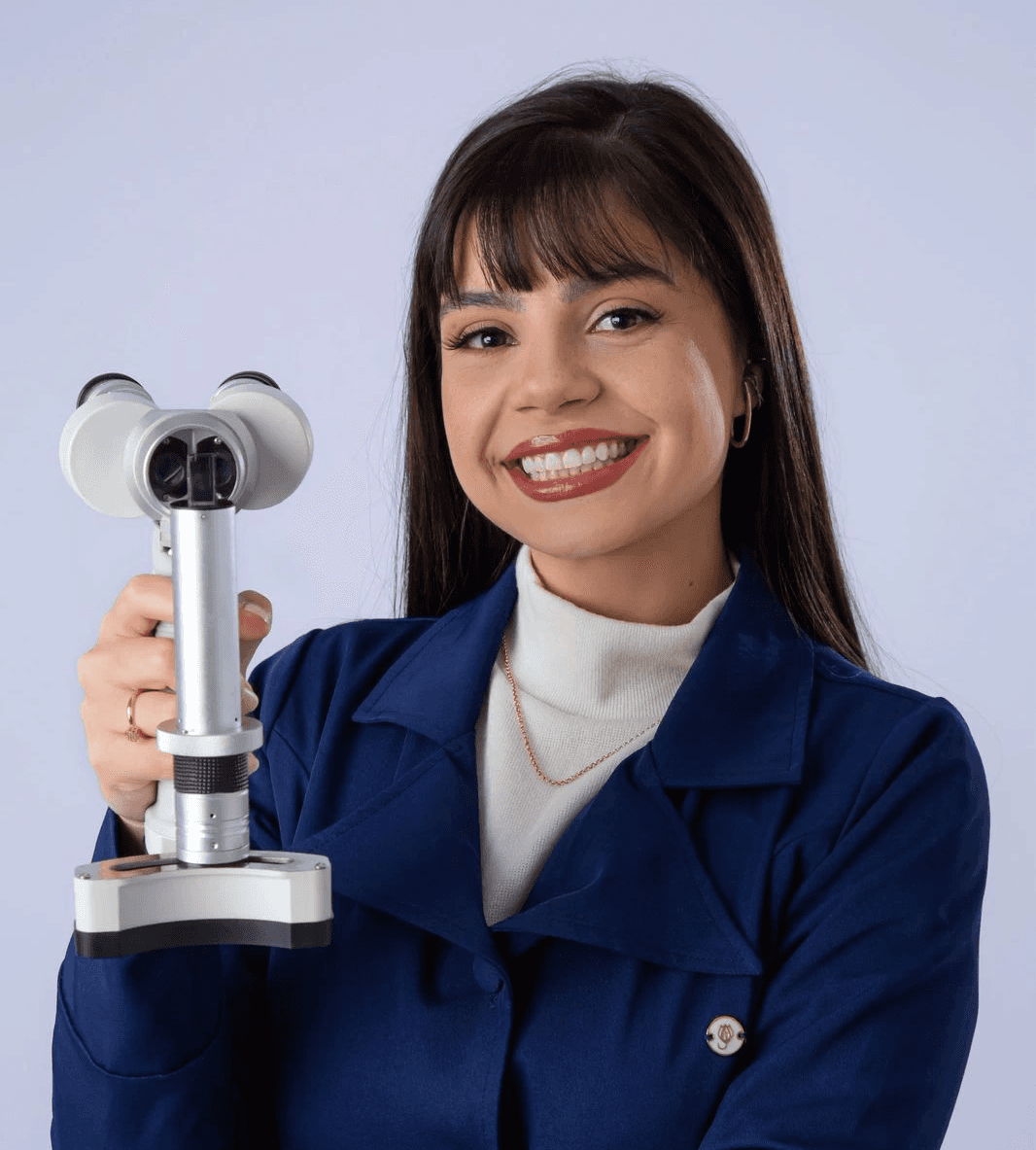 man in blue crew neck t-shirt smiling