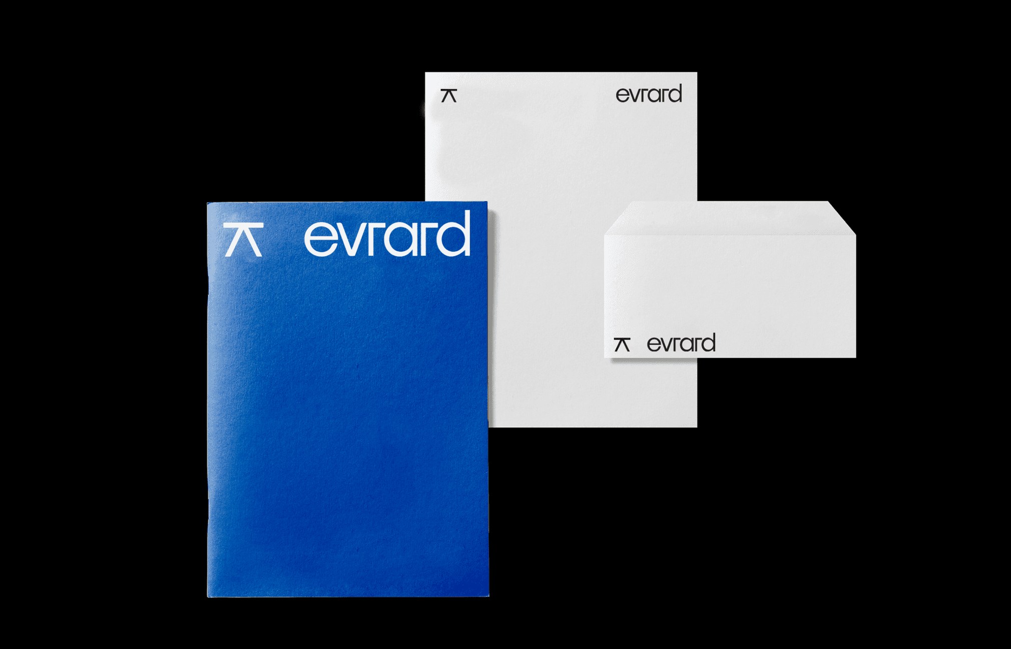 Papeterie Evrard comprenant une brochure bleue, une feuille et une enveloppe blanches