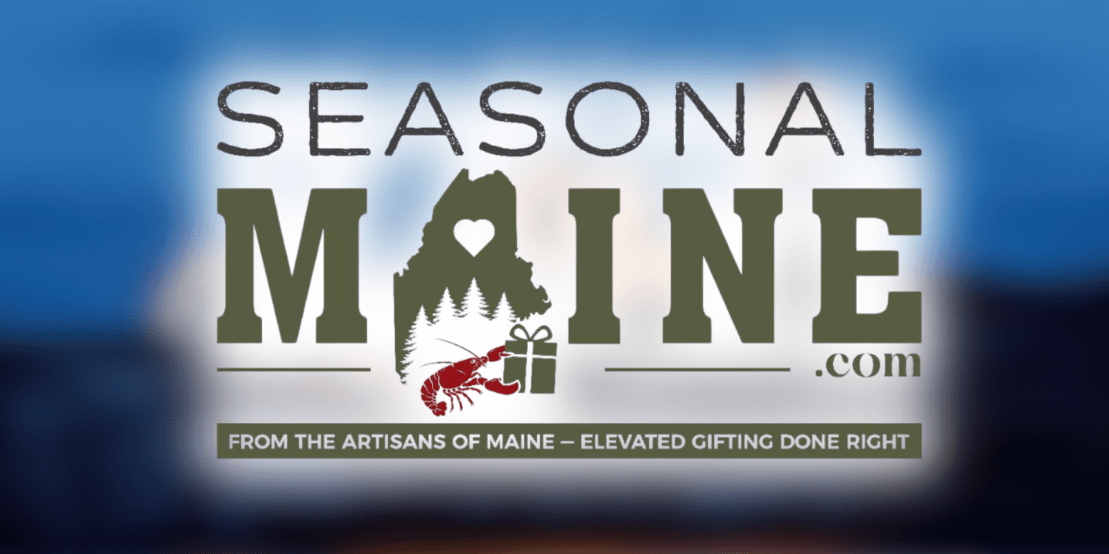 Seasonal Maine logo featuring a winter-themed design, symbolizing curated gift boxes celebrating Maine's holiday spirit.