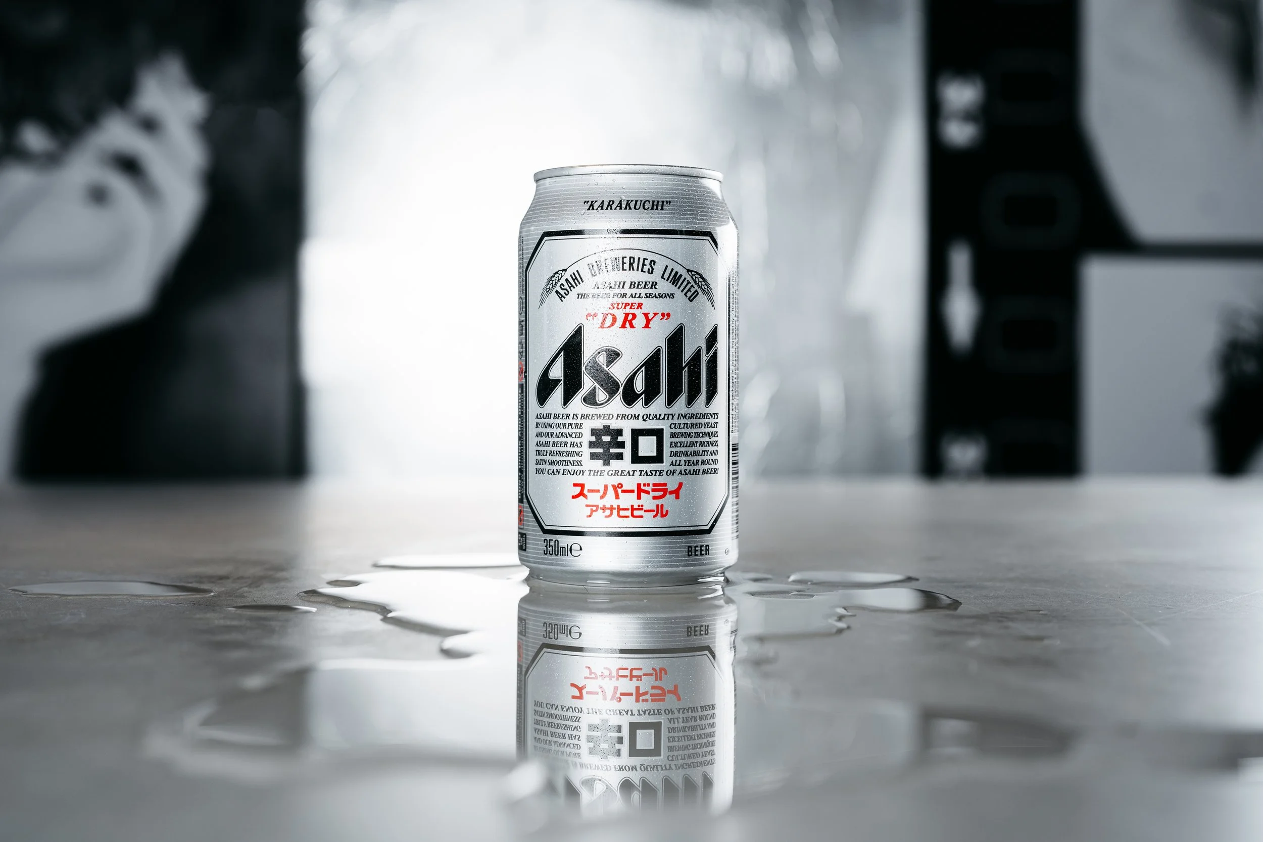 Asahi Super Dry aluminum can showcasing minimalist typography and precision lettering as part of its premium beer branding system.