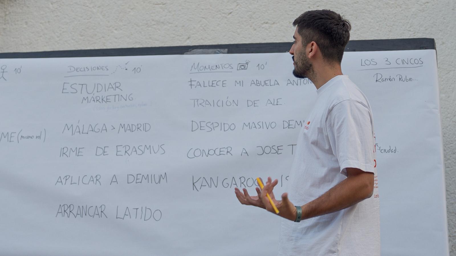 people laughing and talking outside during daytime