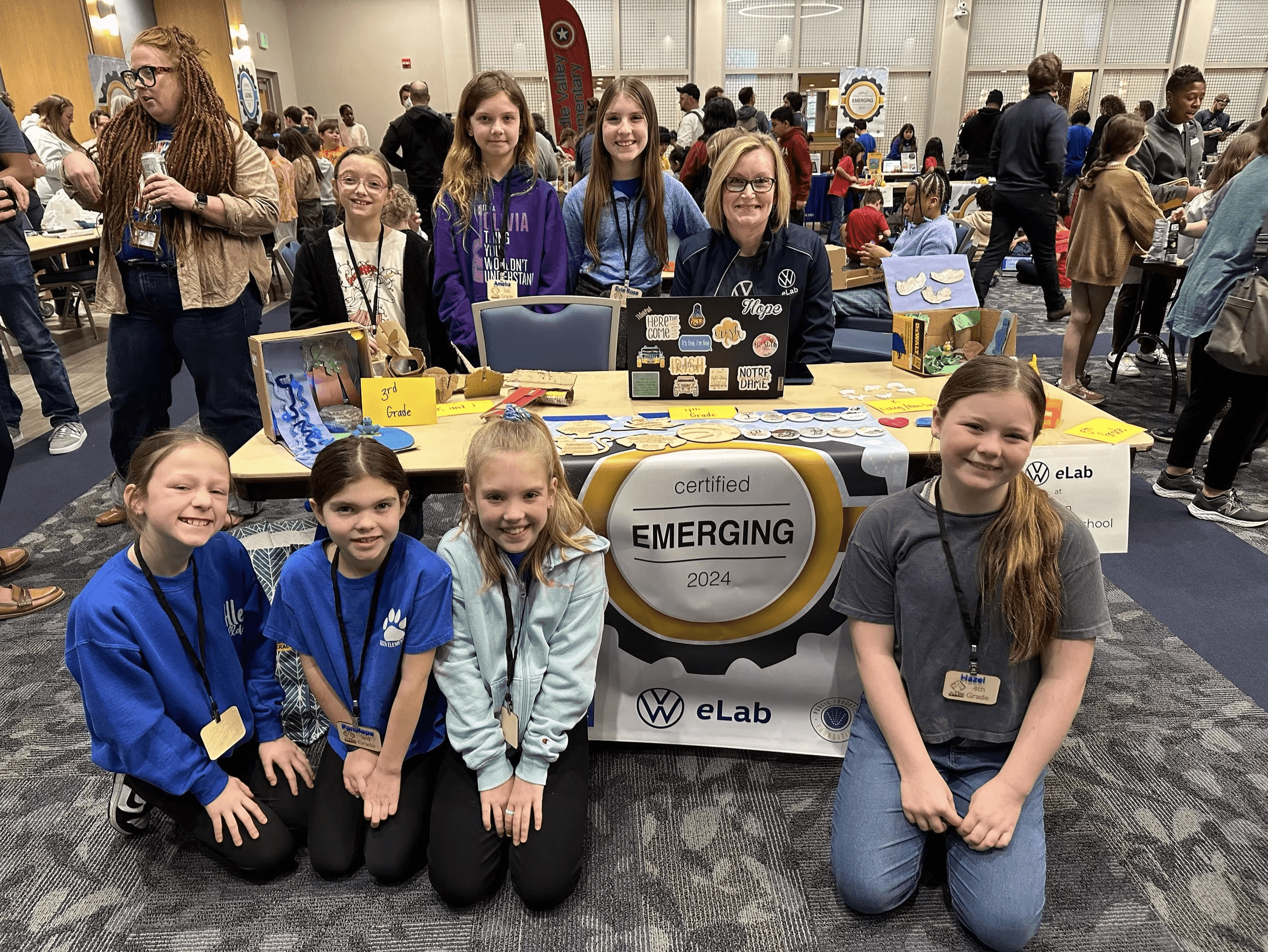 Students from Allen Elementary School gathered for a group photo at a VW eLab showcase.