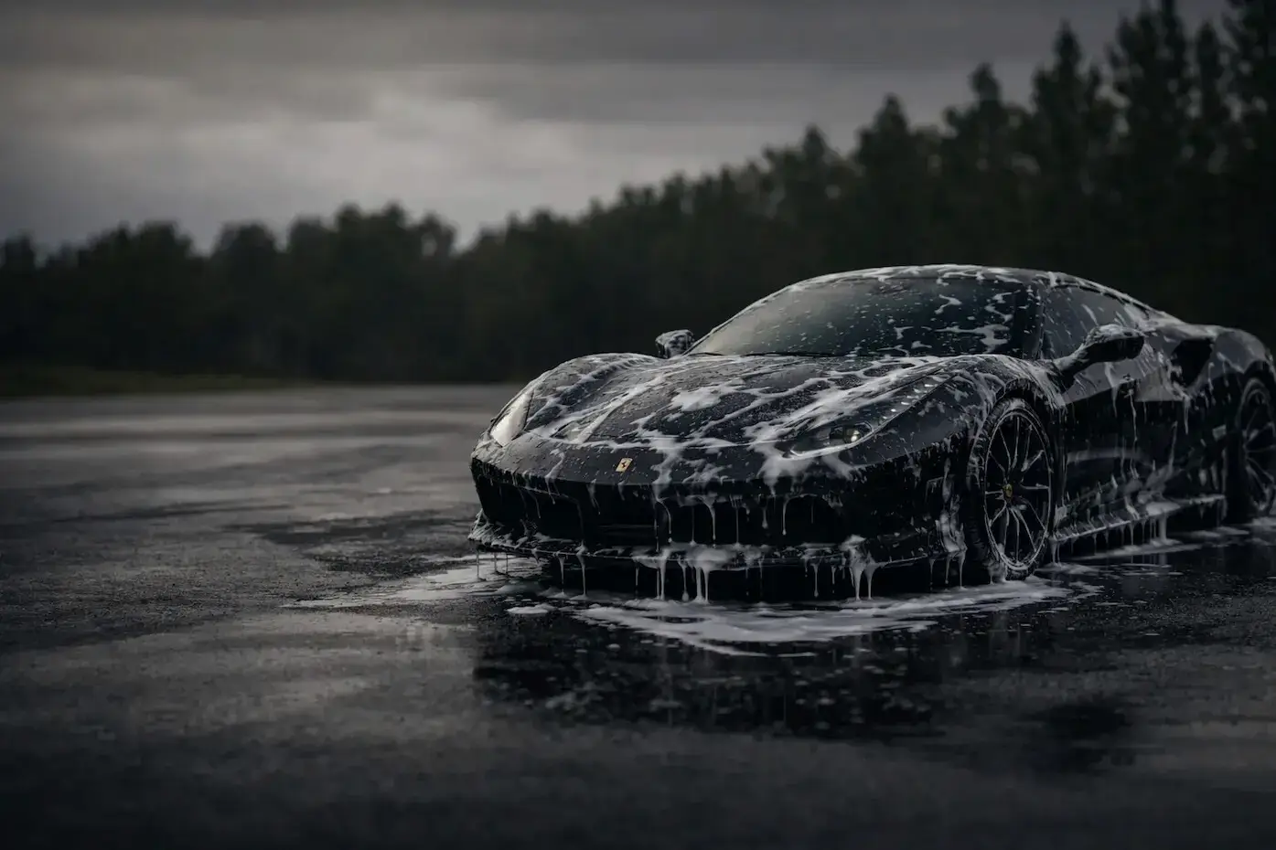 Image of a car with snow foam dripping off it