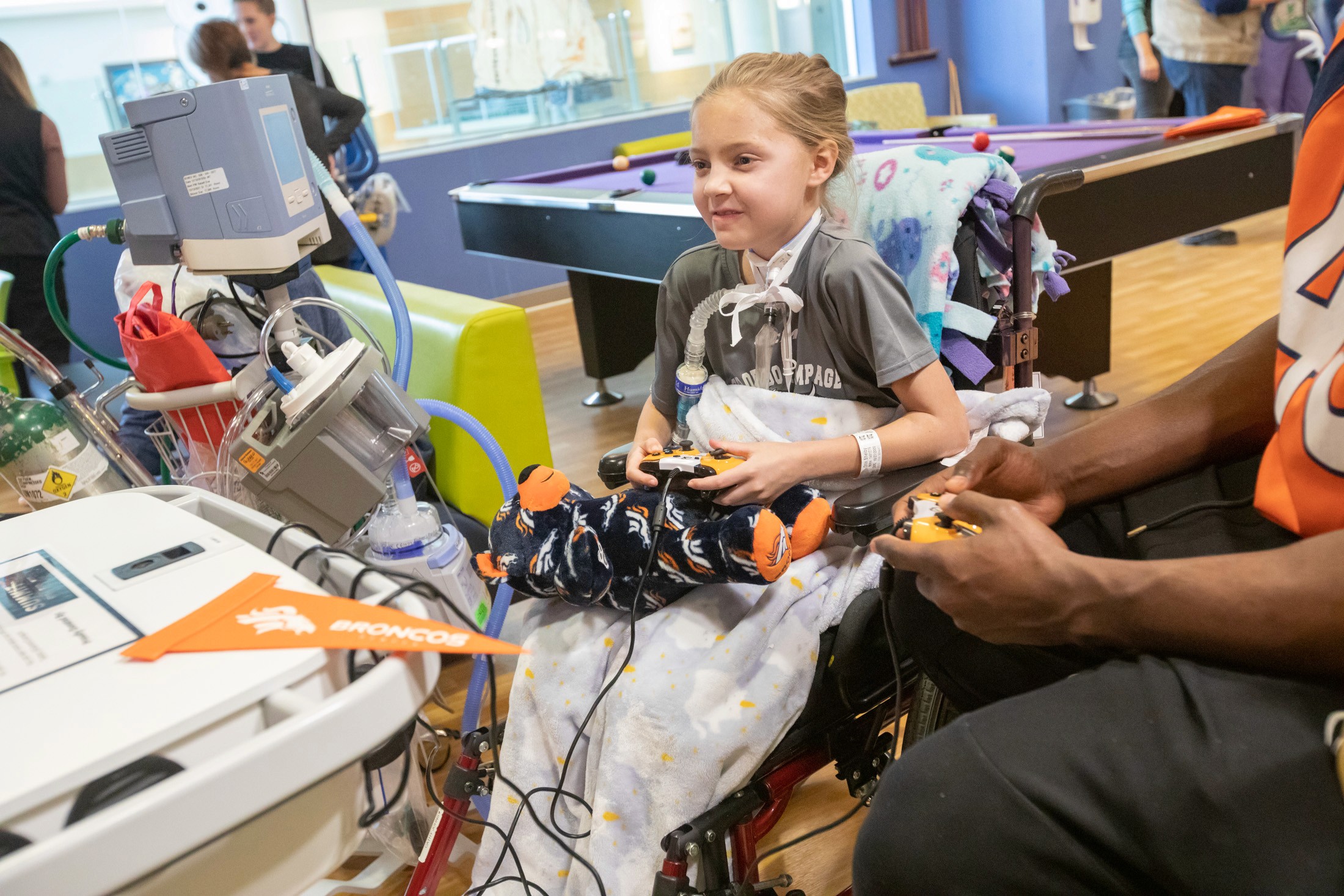 A young gamer at Children's Hospital Colorado enjoys some competition on a GO Kart.