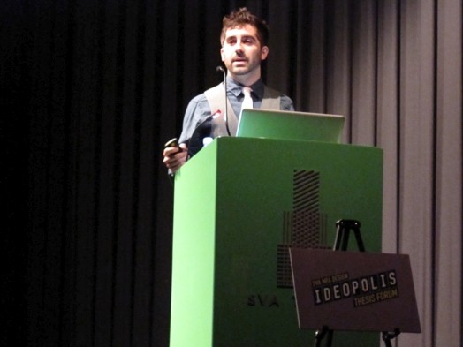 portrait of a man at the stand giving a speech