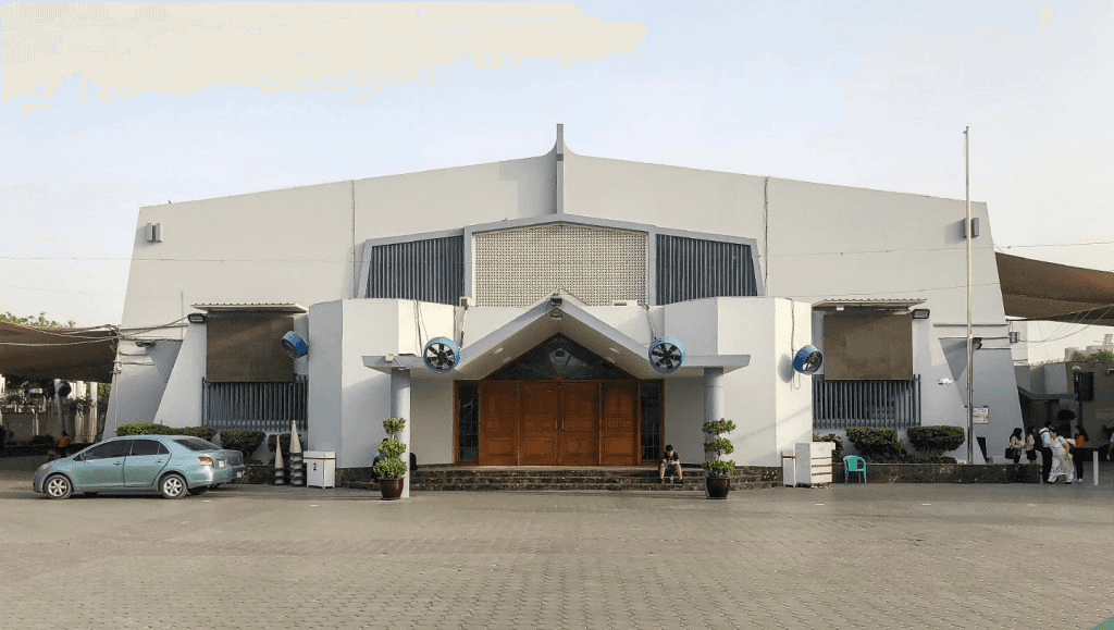 Large white building entrance with a blue sign reading "Semmer Villas."