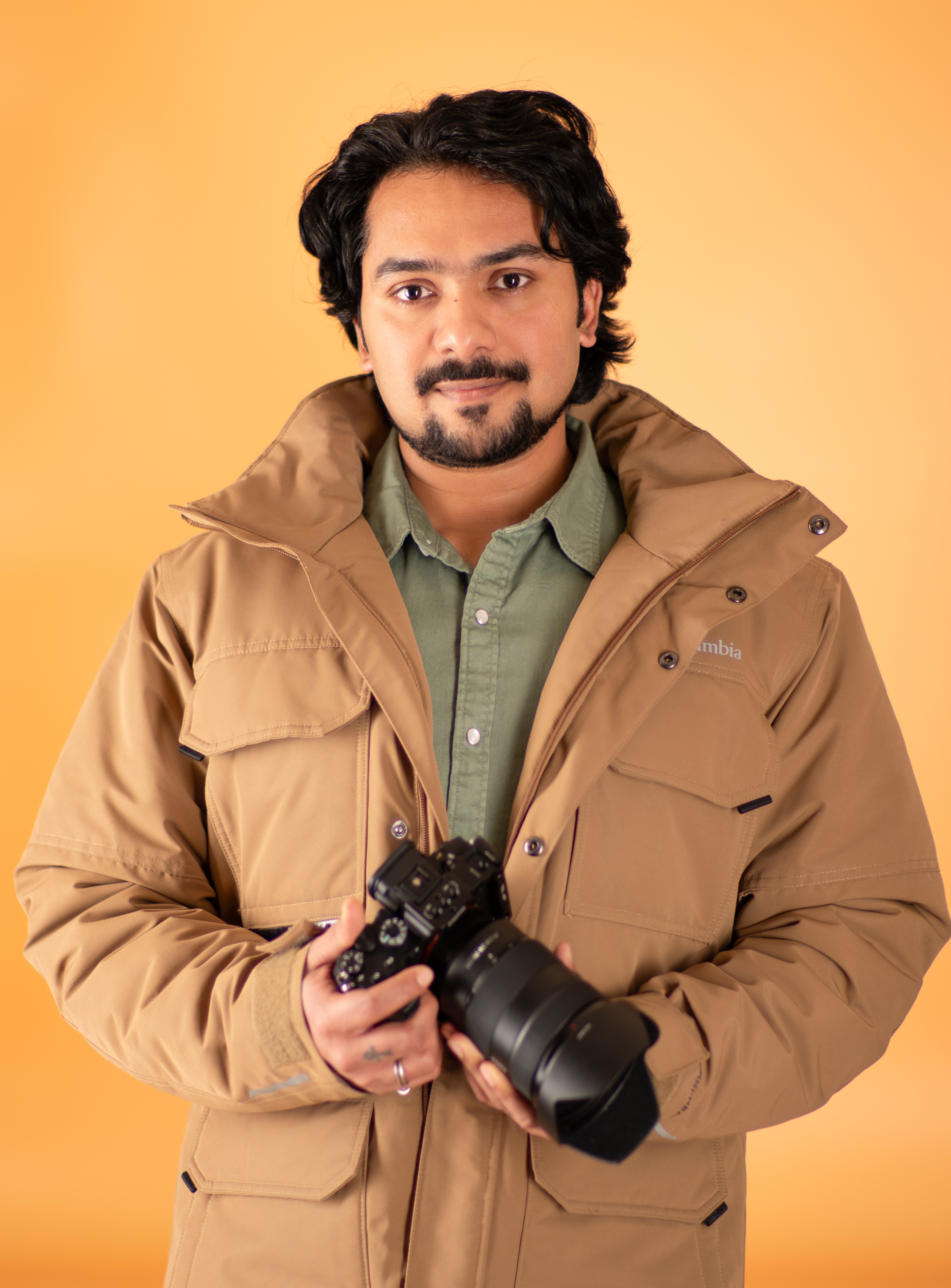 Portrait of a man with glasses and beard