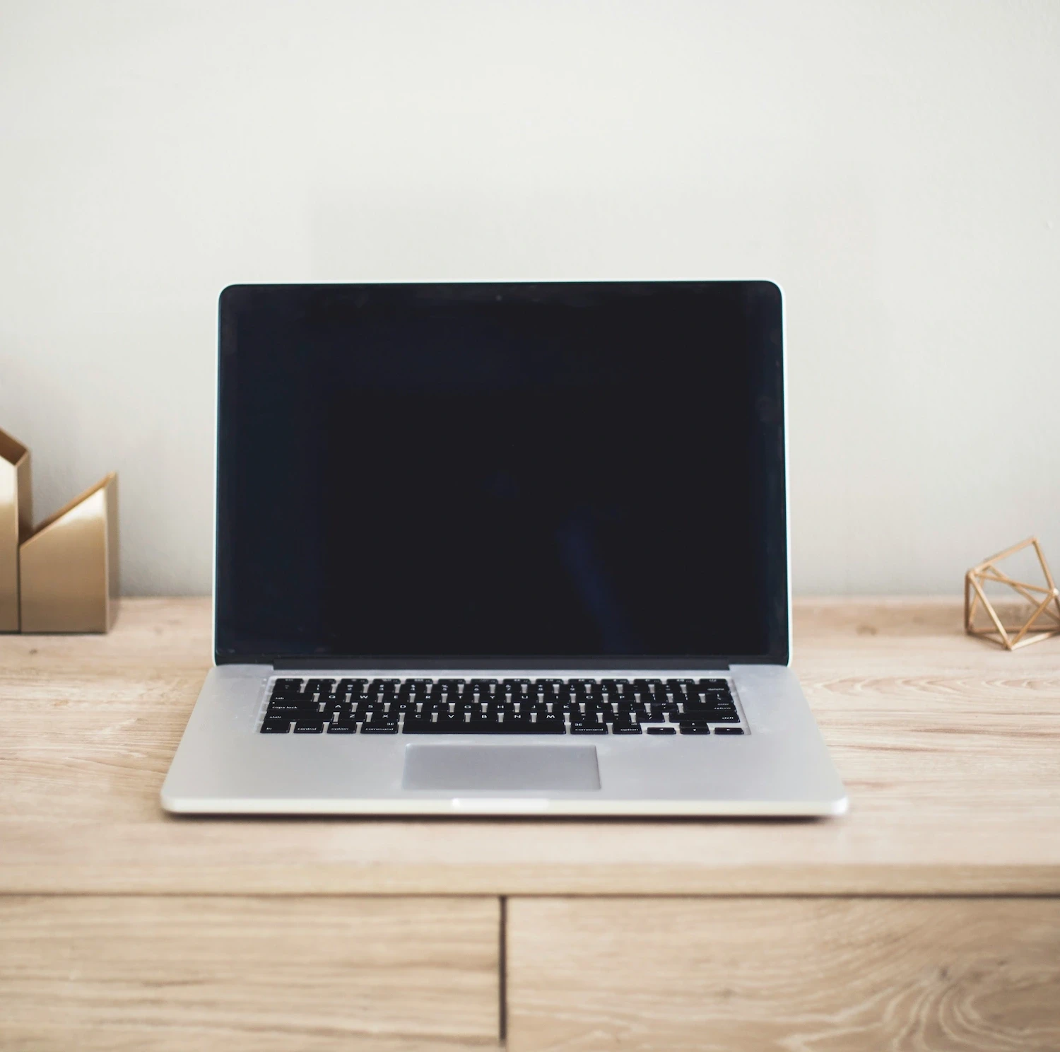 Open laptop on desk symbolizing access to gay therapy online, supporting lgbtq counseling and affirming care