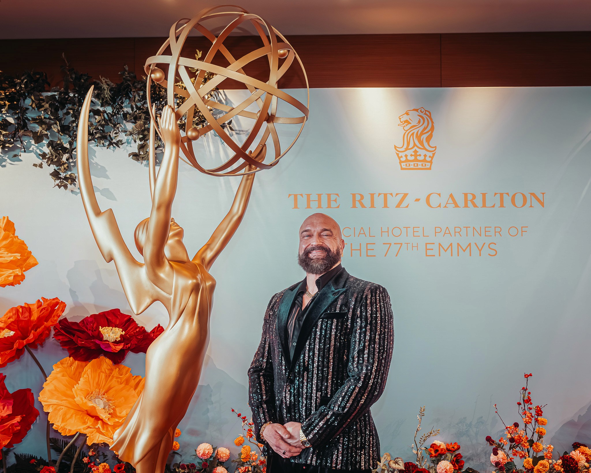Actor Landon Brittain red carpet photo at 2025 Emmy Awards Los Angeles.