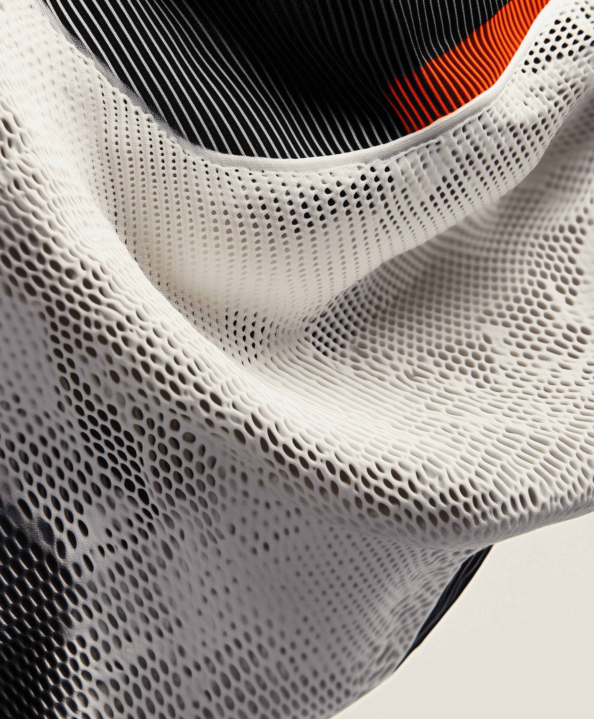  A close-up of the Nike ACG technical fabric, against a clean white background. The composition focuses on highlighting details like mesh textures or braided lines in black and grey, clean and minimal aesthetic, emphasizing depth to create contrast between softness and strength. This design emphasizes comfort while adding a modern style for camping activities., hyper-realistic, in a white fabric texture with black and orange accents, with an orange and black swoosh against a white background. The design is made from woven fabric in shades of gray and cream