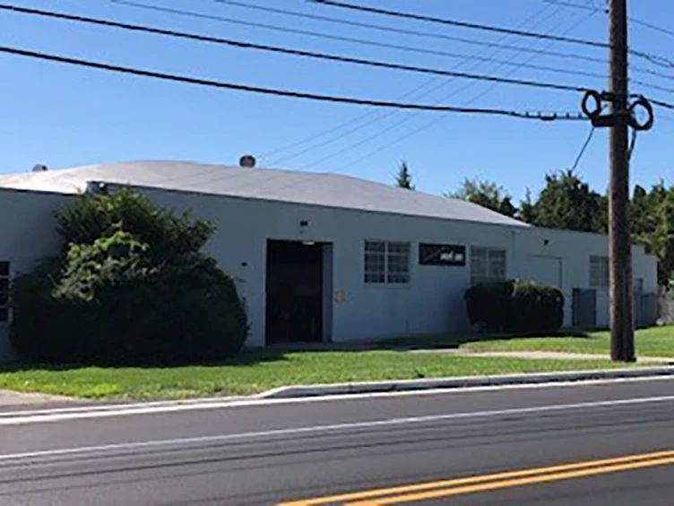 One story office building and garage.