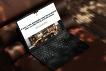 Mockup du site web de Léni Studio sur ordinateur portable, présentant un slogan sur la modernisation de l’image des entreprises et une photo de bureau moderne.