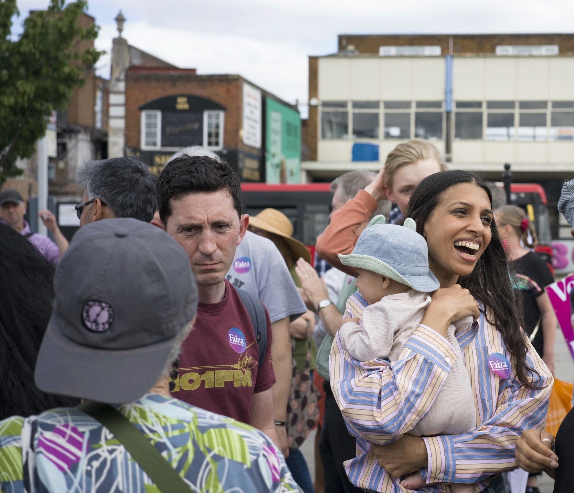 Diverse group of people outside at community gathering