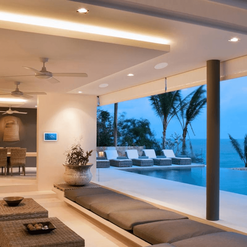 Modern living room with ocean view and pool