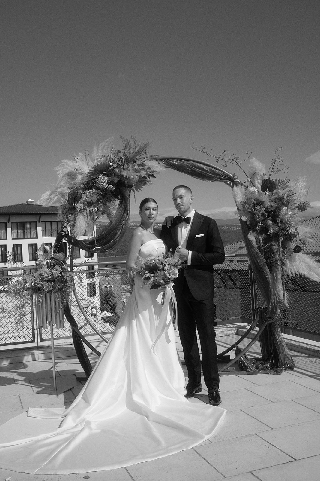 Married couple posing after the ceremony