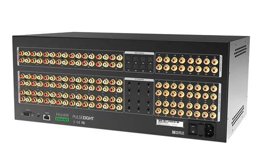 Black audio matrix switcher with many RCA connectors.