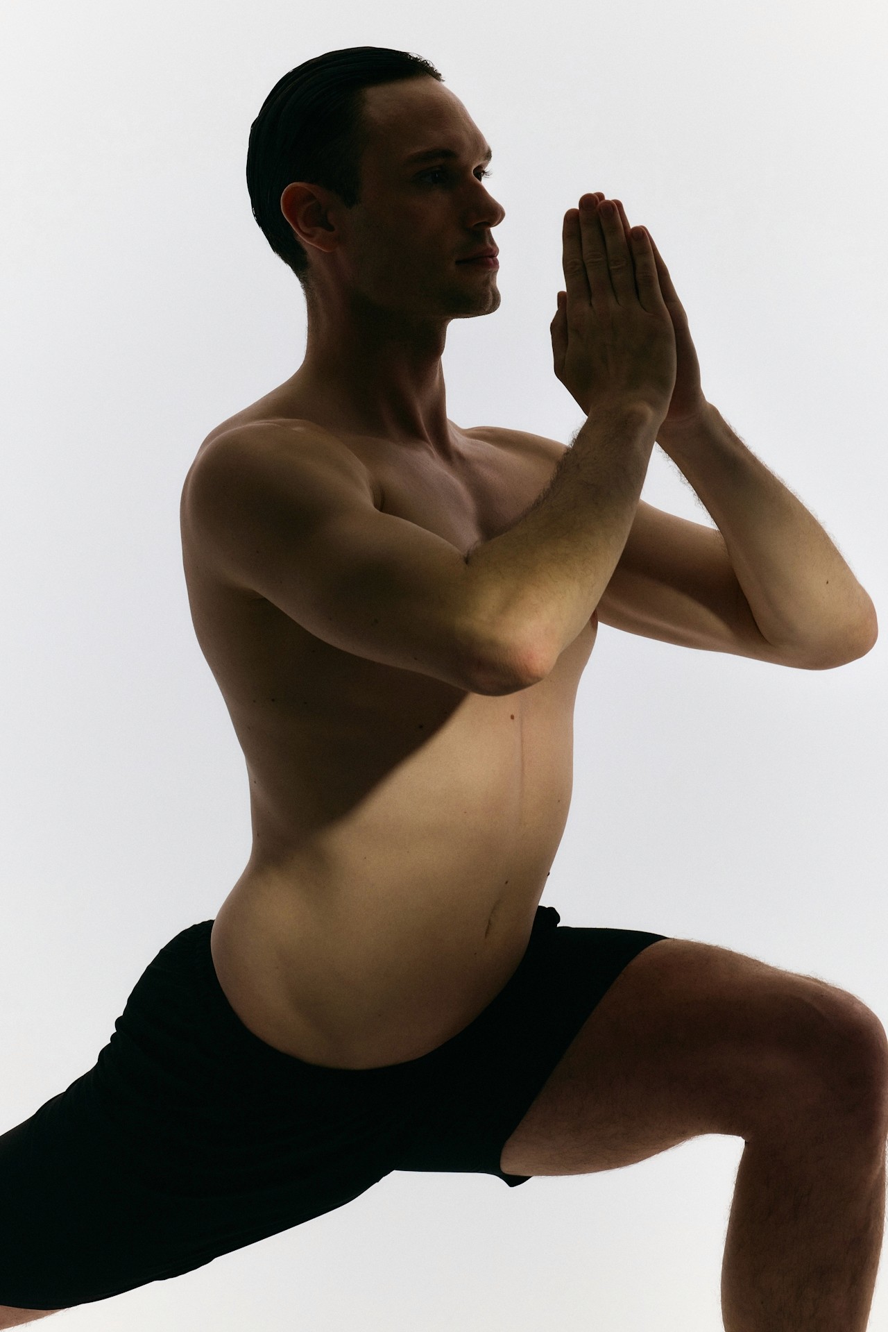 A yoga pose focused on stretching the legs.