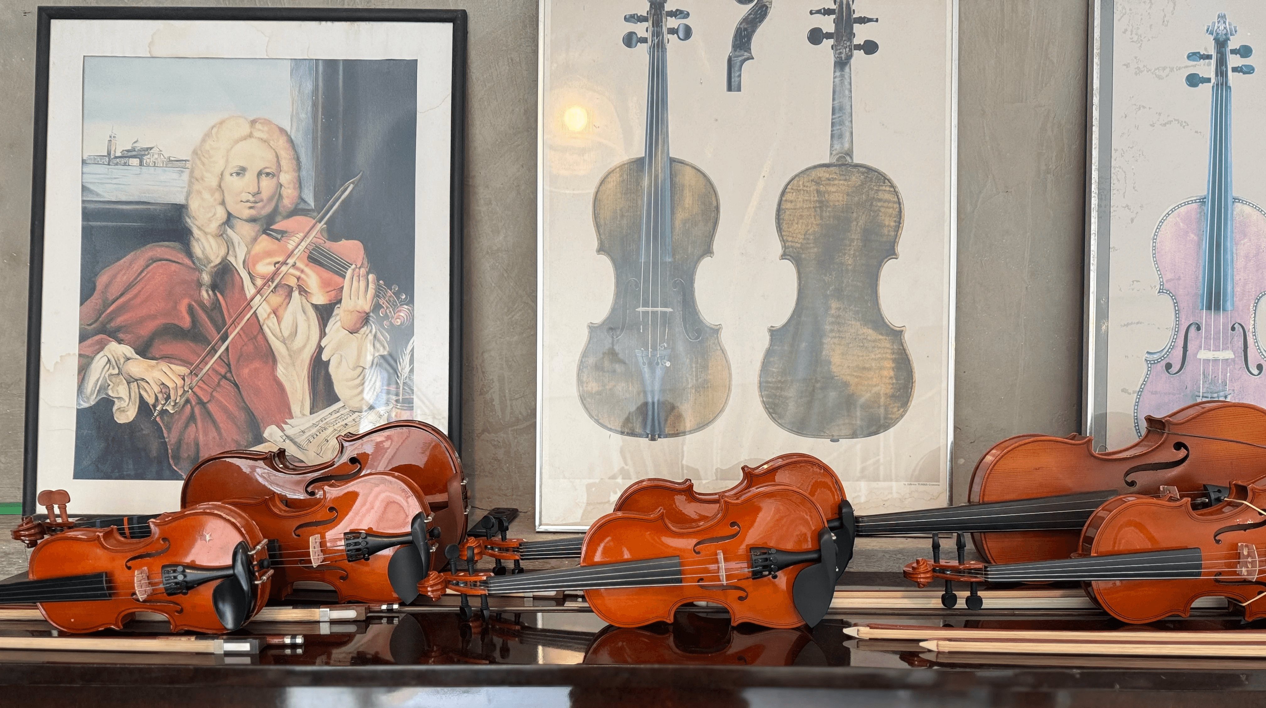brown violin on black table
