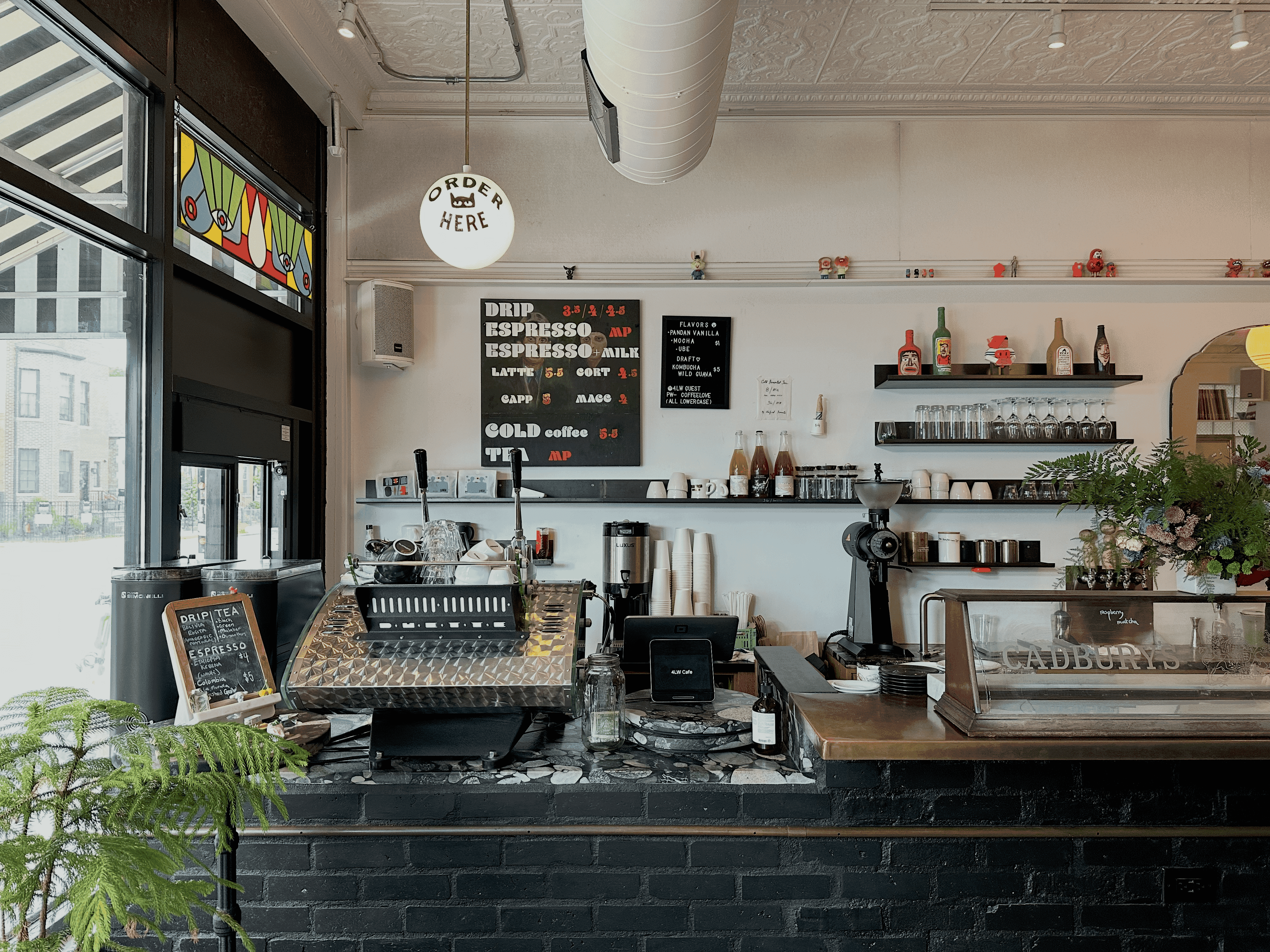 Interior of a specialty coffee shop looking at the counter