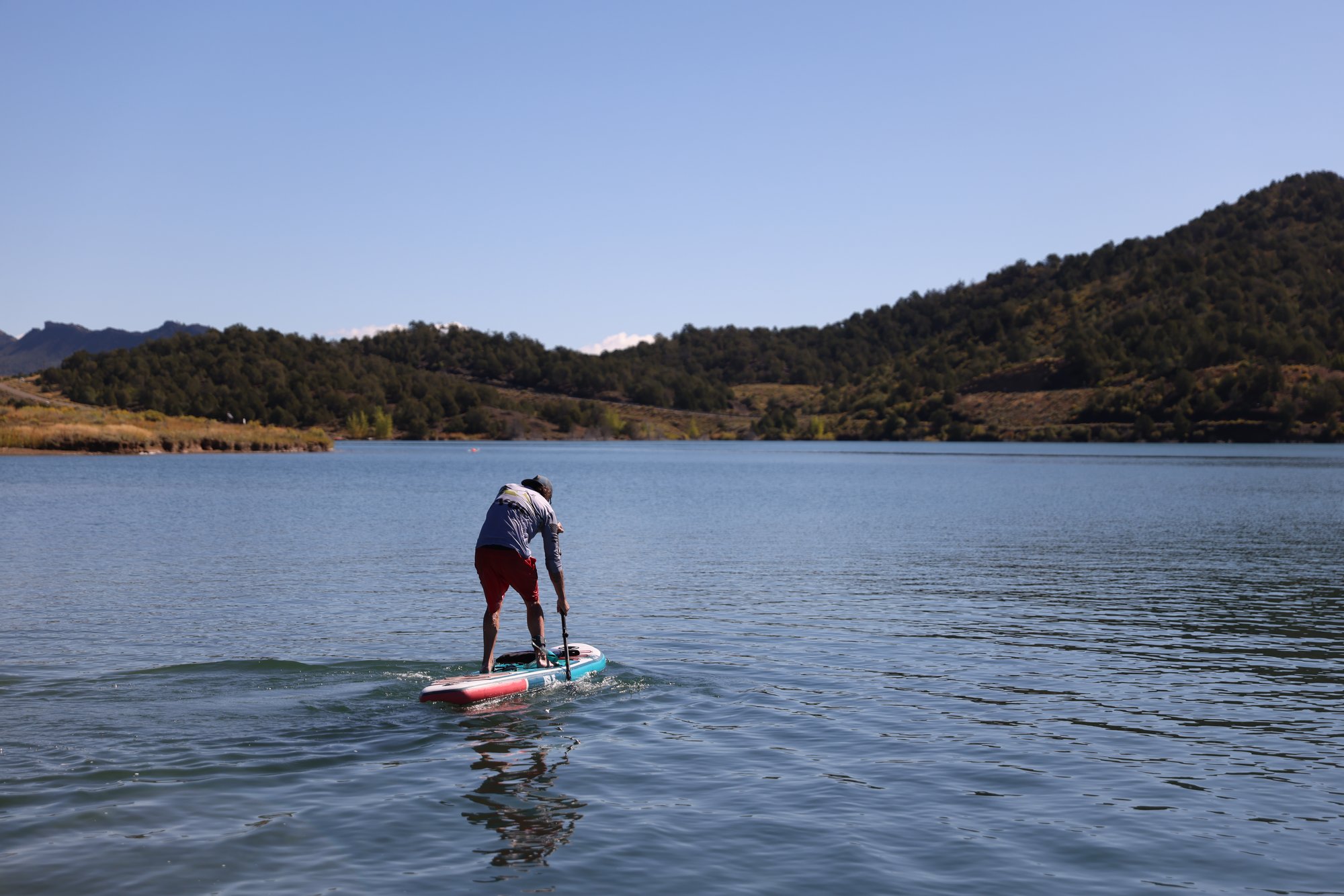 Stand-up paddleboarder on Lake Nighthorse