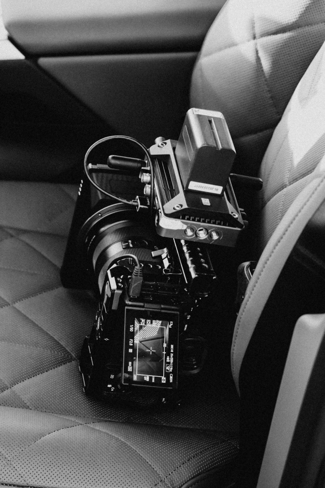 Black-and-white image of a camera mounted on a rig