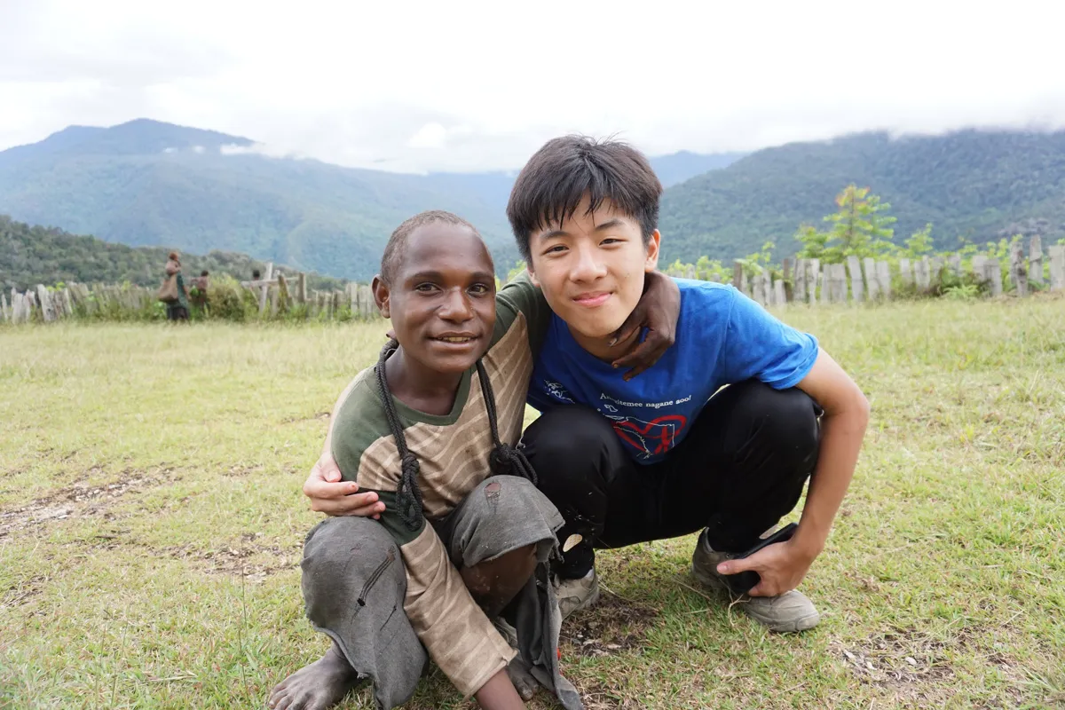 people laughing and talking outside during daytime