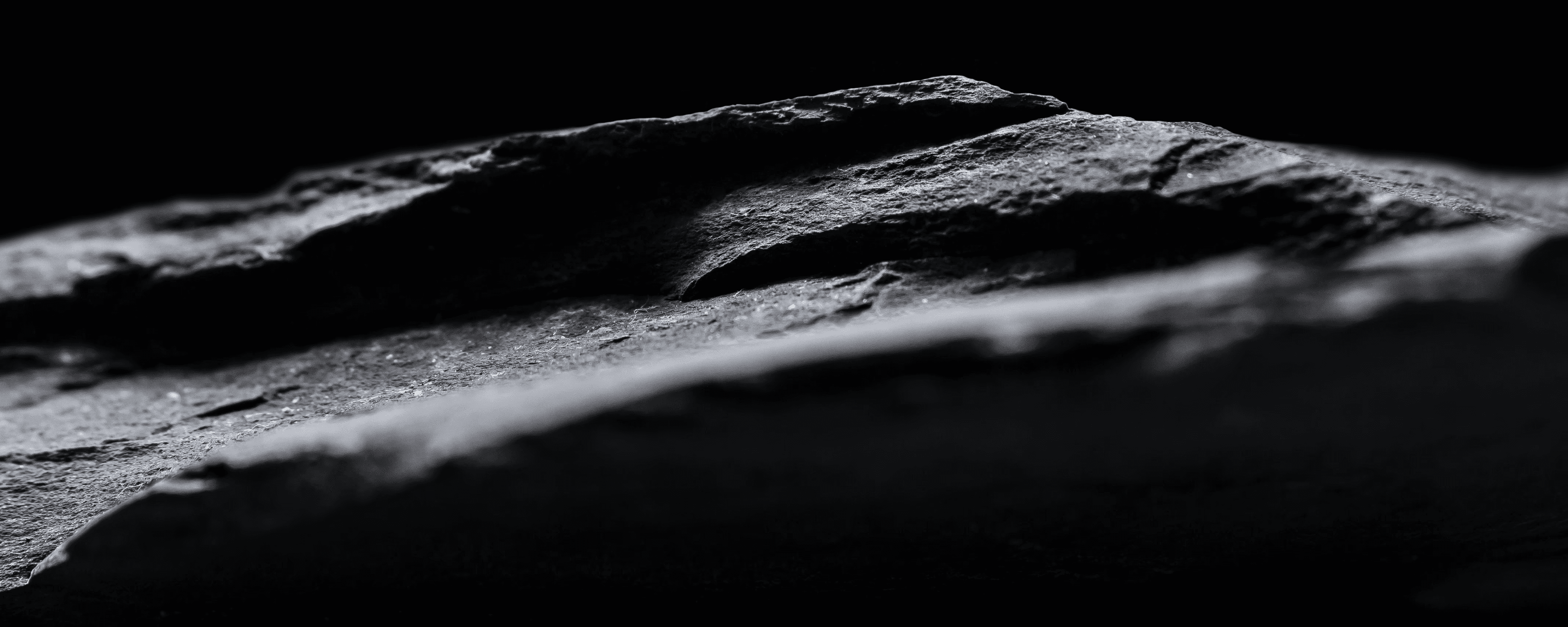 a close up of a rock wall made of rocks
