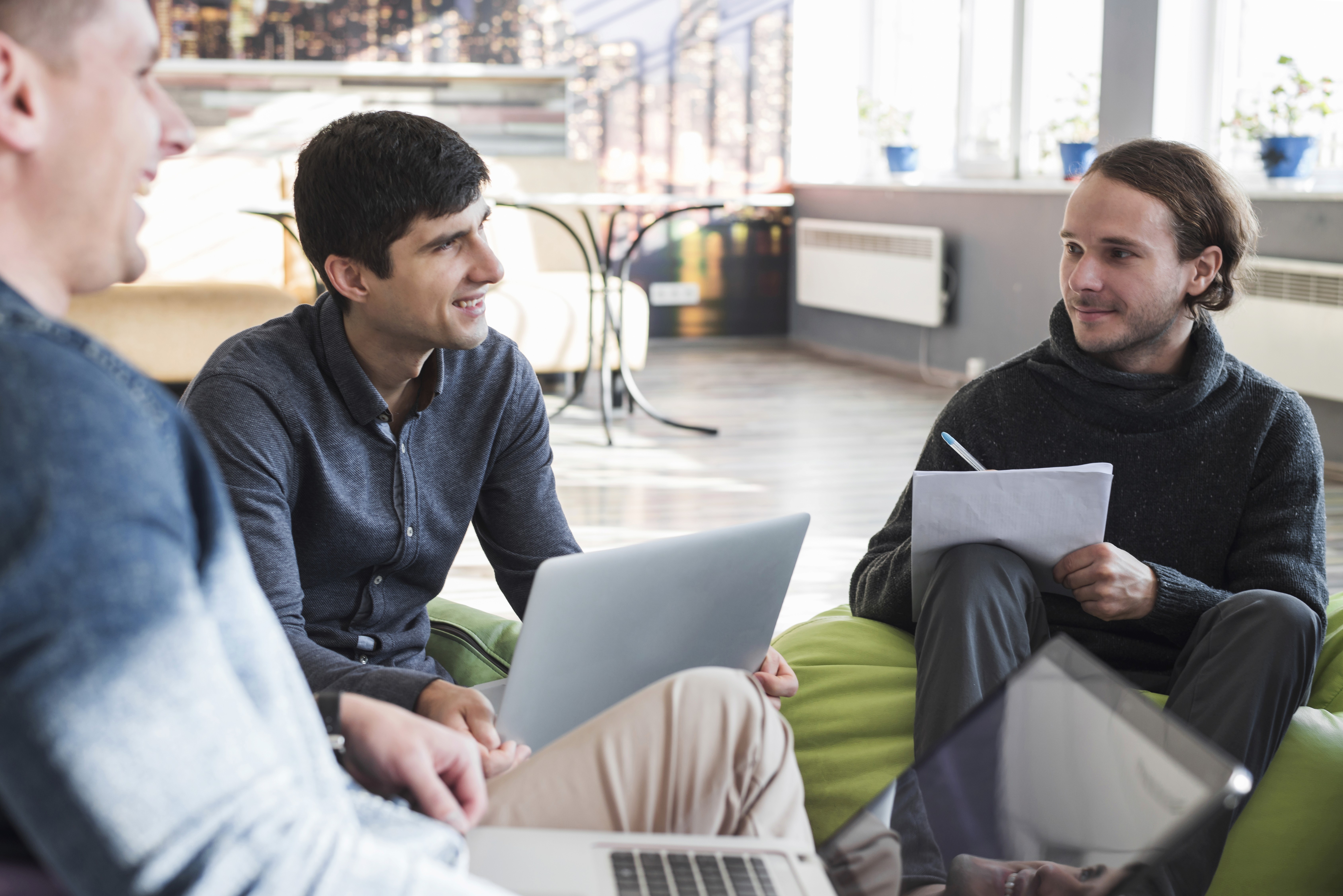 Green glass-metallic background with statistic cards
