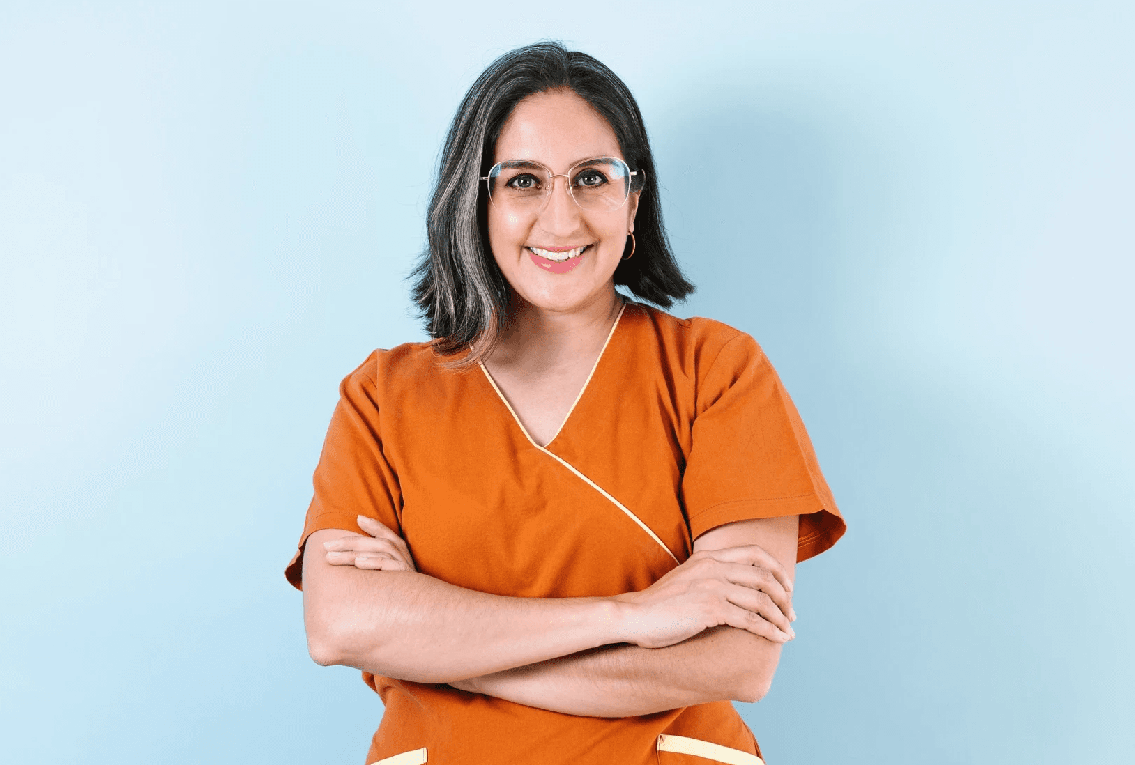 Female nurse in blue scrubs