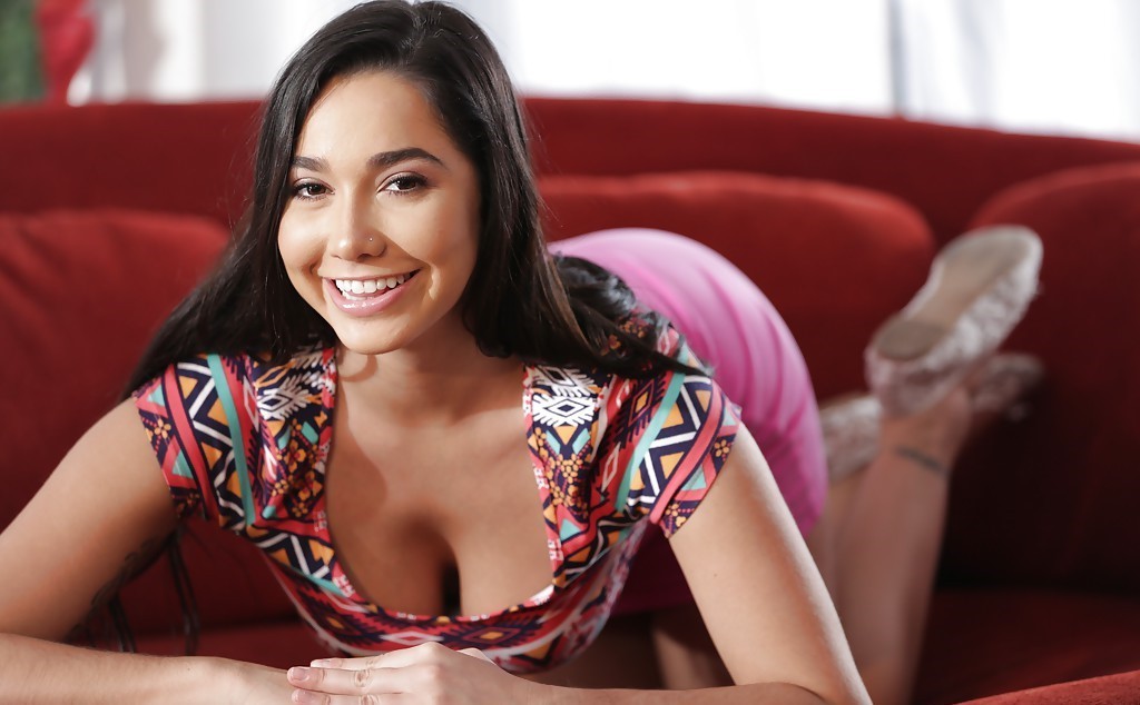kids lying on a glass land and smiling
