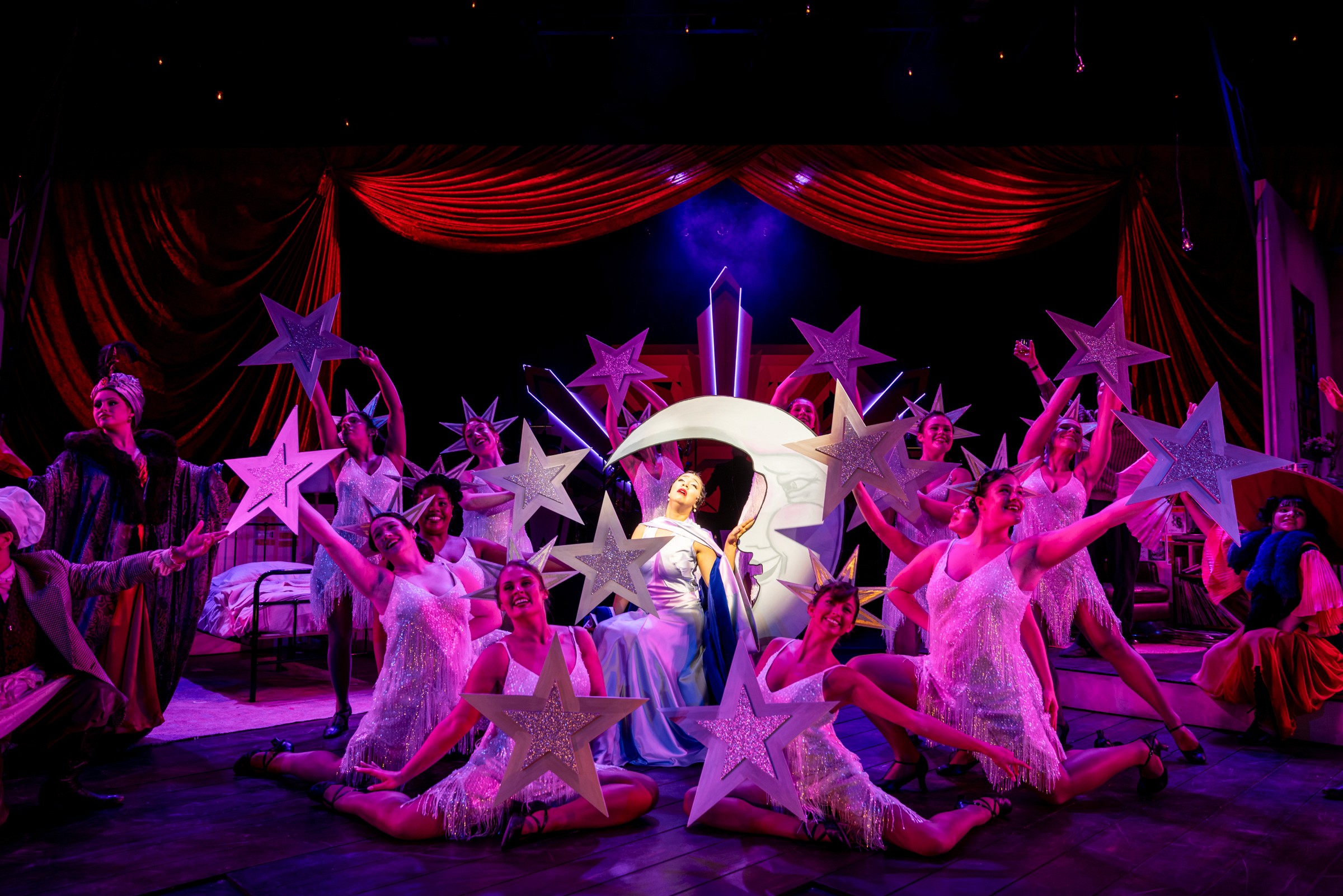 Janet Van De Graaff surrounded by star dancers