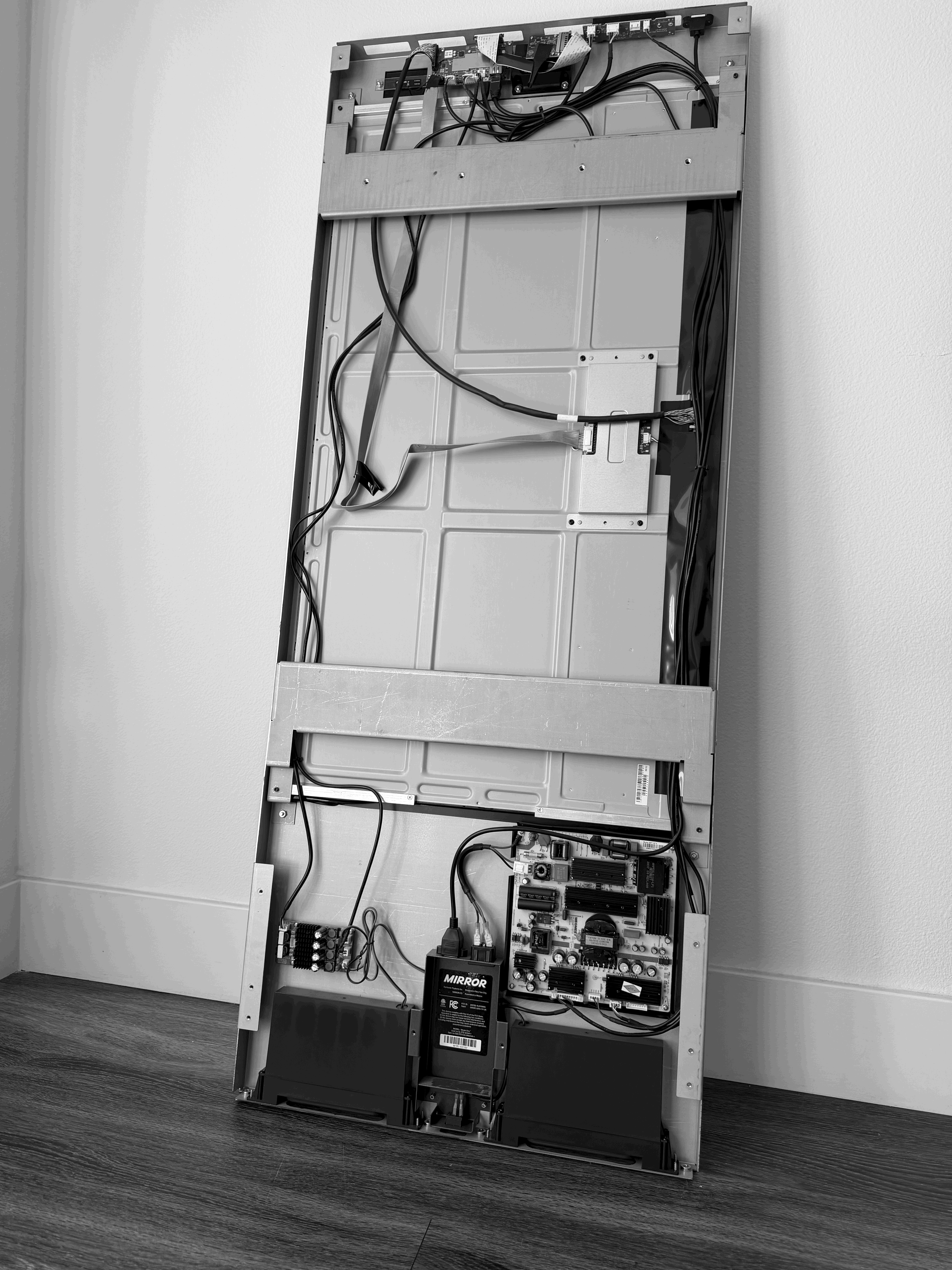 Batch.Works logo over a photo of a box of 3D printed objects