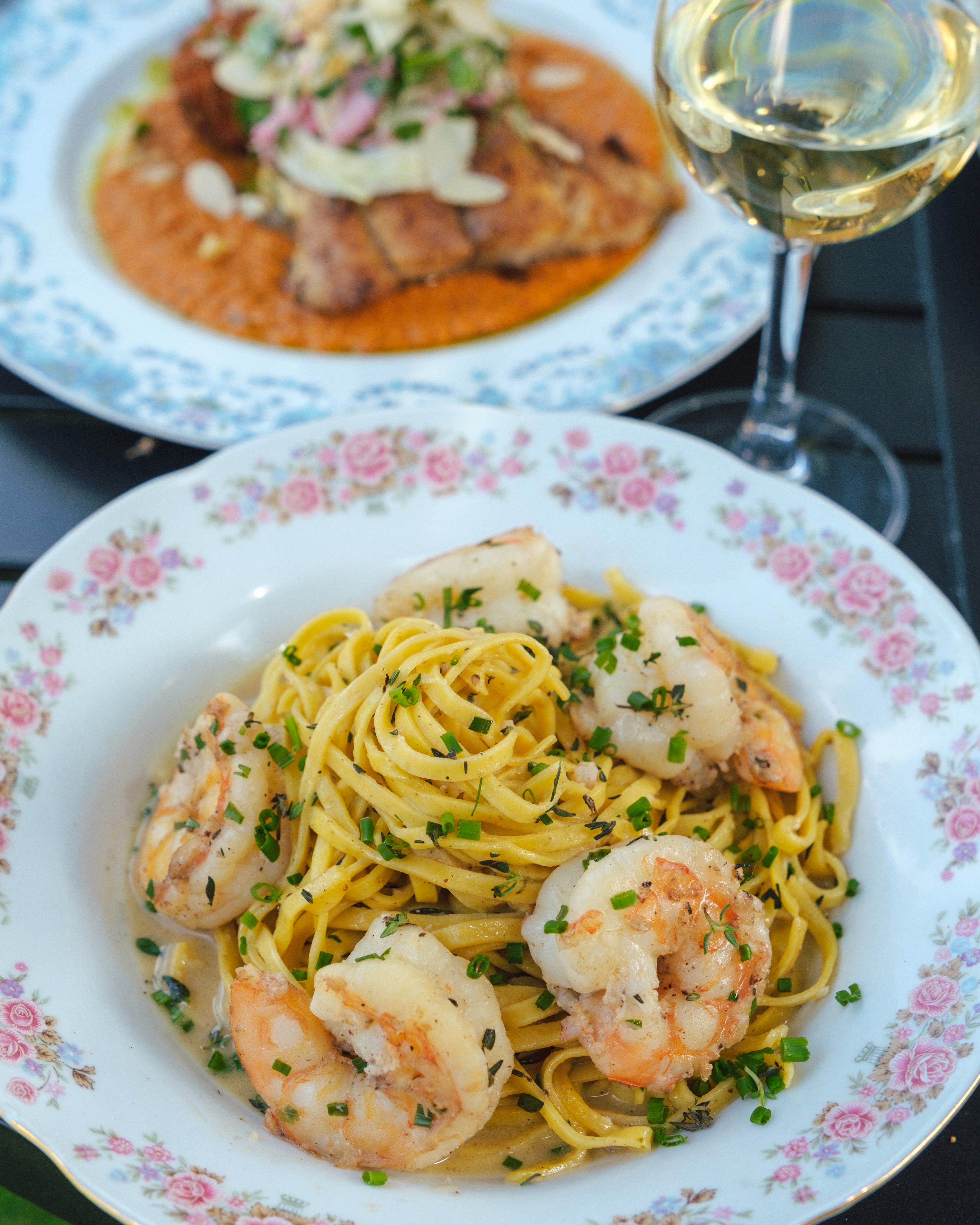  A shrimp scampi dish served with linguine pasta at a restaurant
