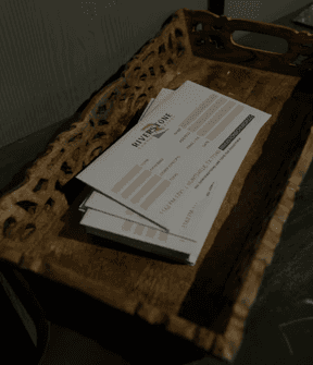 person getting 1 U.S. dollar banknote in wallet