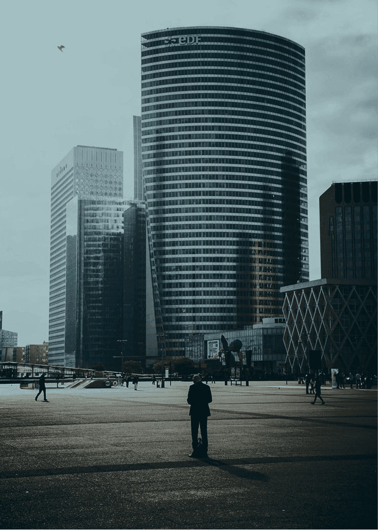 a view of some very tall buildings in a paris la défense