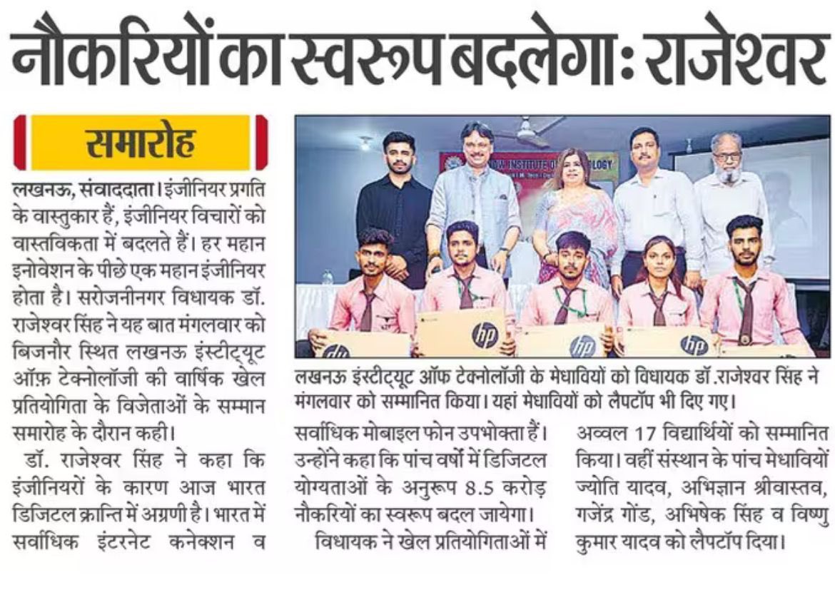 man standing in front of people sitting beside table with laptop computers