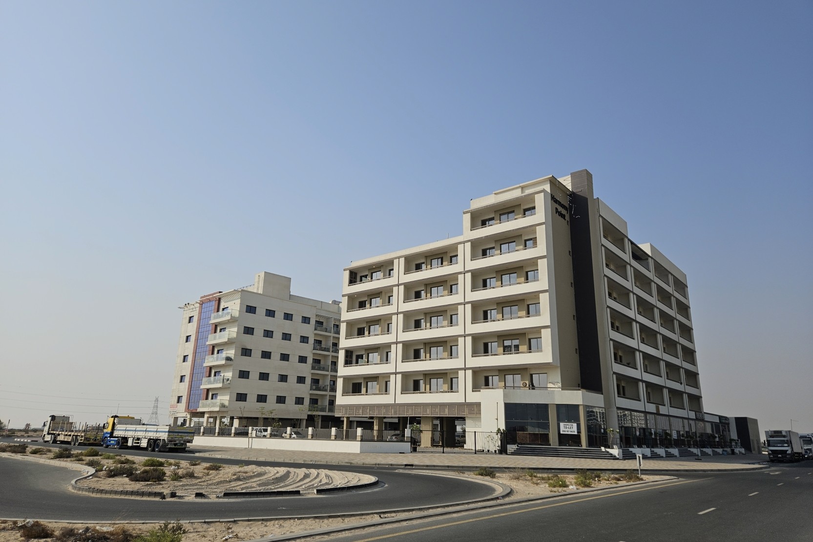 Modern apartment building in Saih Shuaib 2, listed by a professional real estate agent.