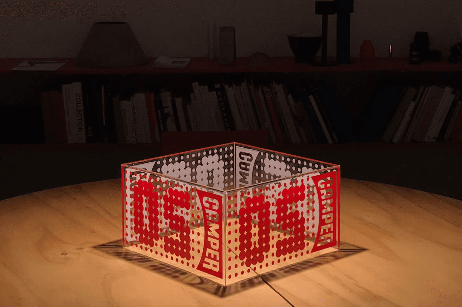Camper 50 plexiglass cube installed in stores, to serve as a custom shoe holder.