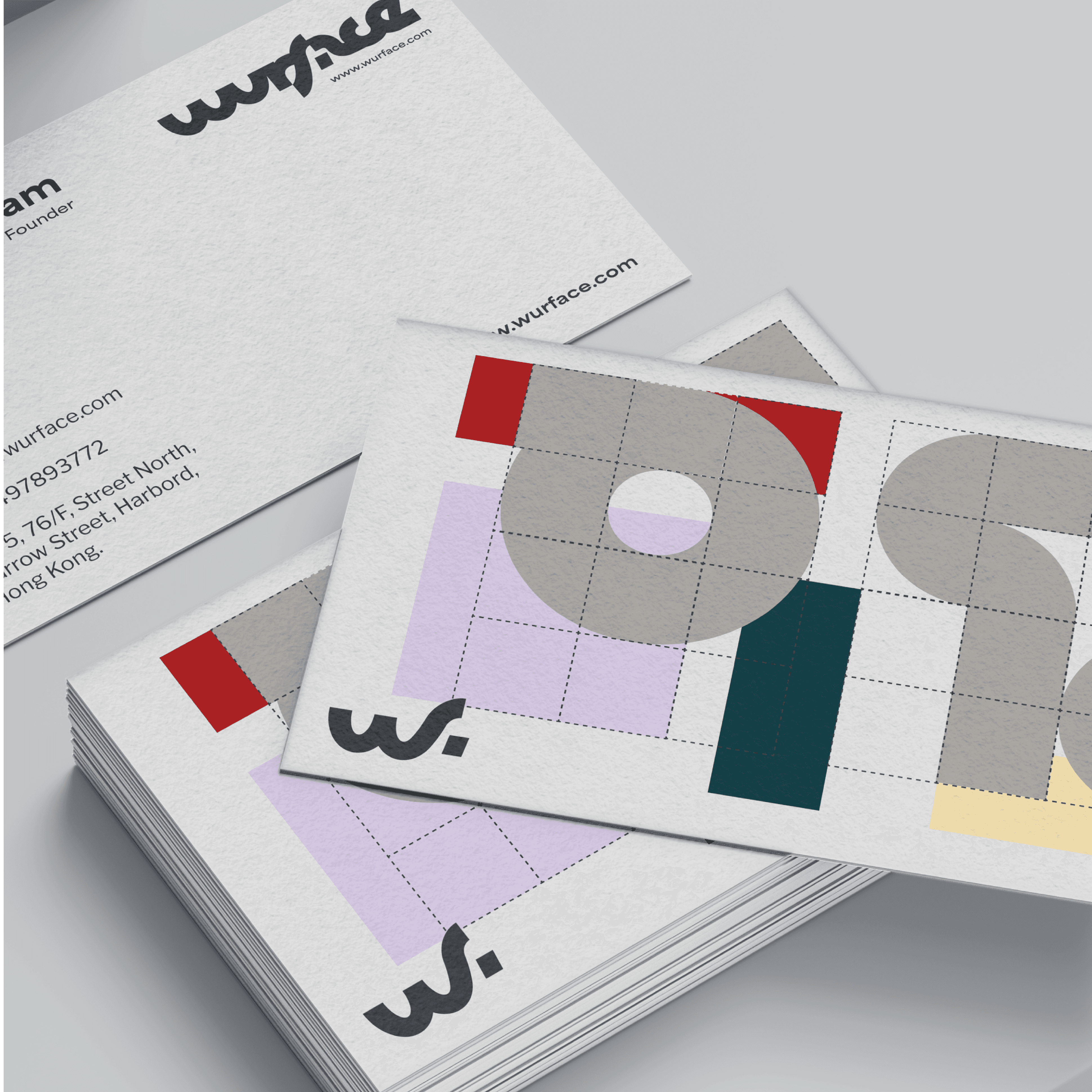 Wurface stationery set with geometric identity elements referencing tile patterns.
