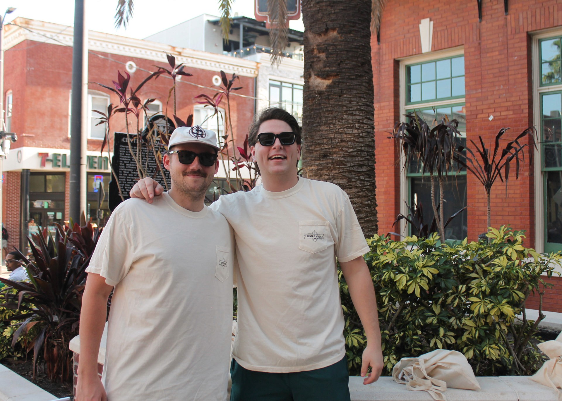 Two men wearing Centro Ybor shirts