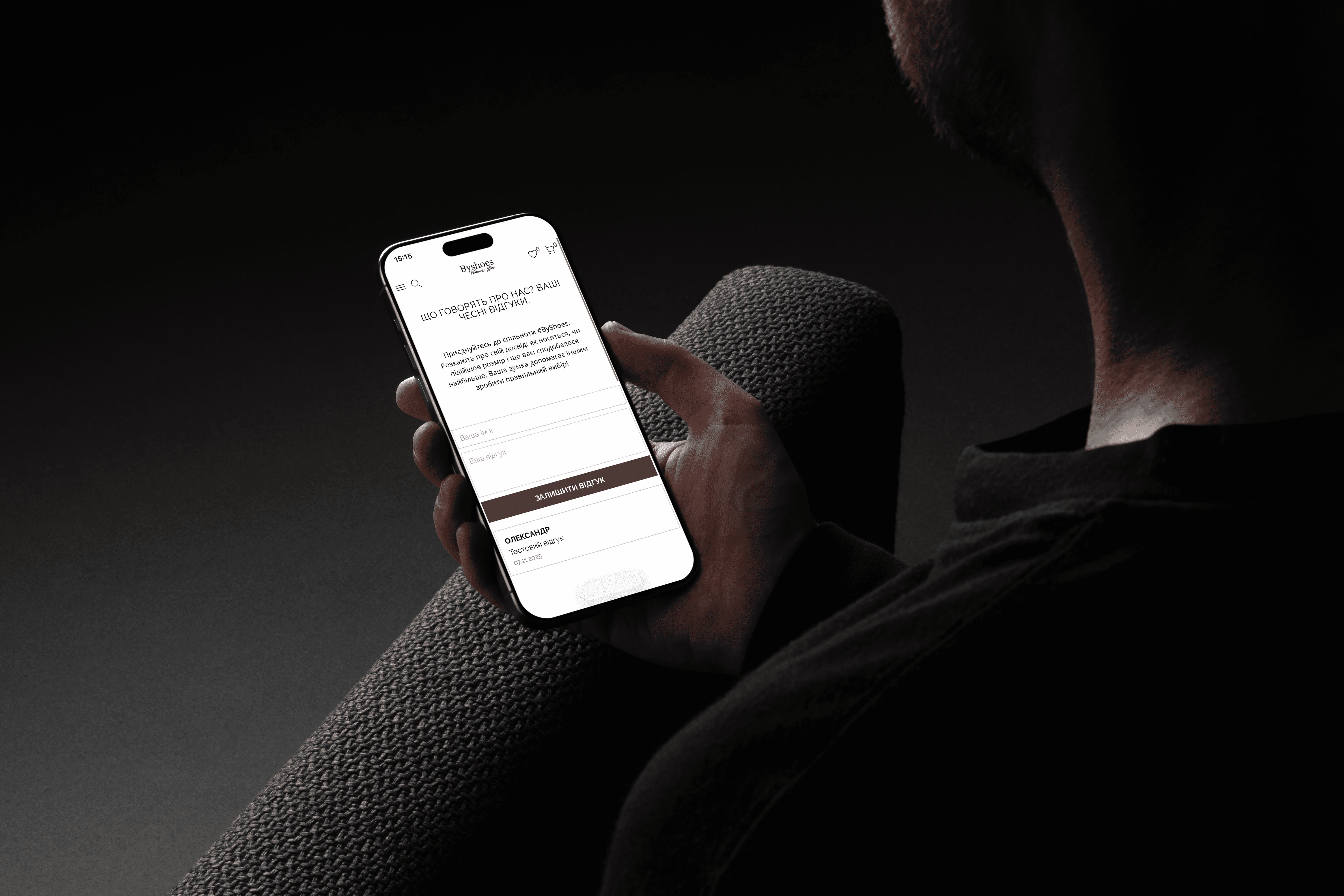 Close-up of lush, dark green leaves, some glossy and wet, against a muted background.
