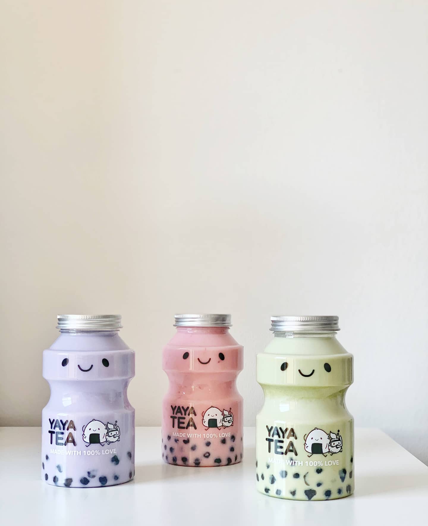 A colorful lineup of Yaya Tea’s most popular bubble teas, including Jasmine Milk Tea and Rose Tea, each topped with perfectly chewy tapioca pearls.