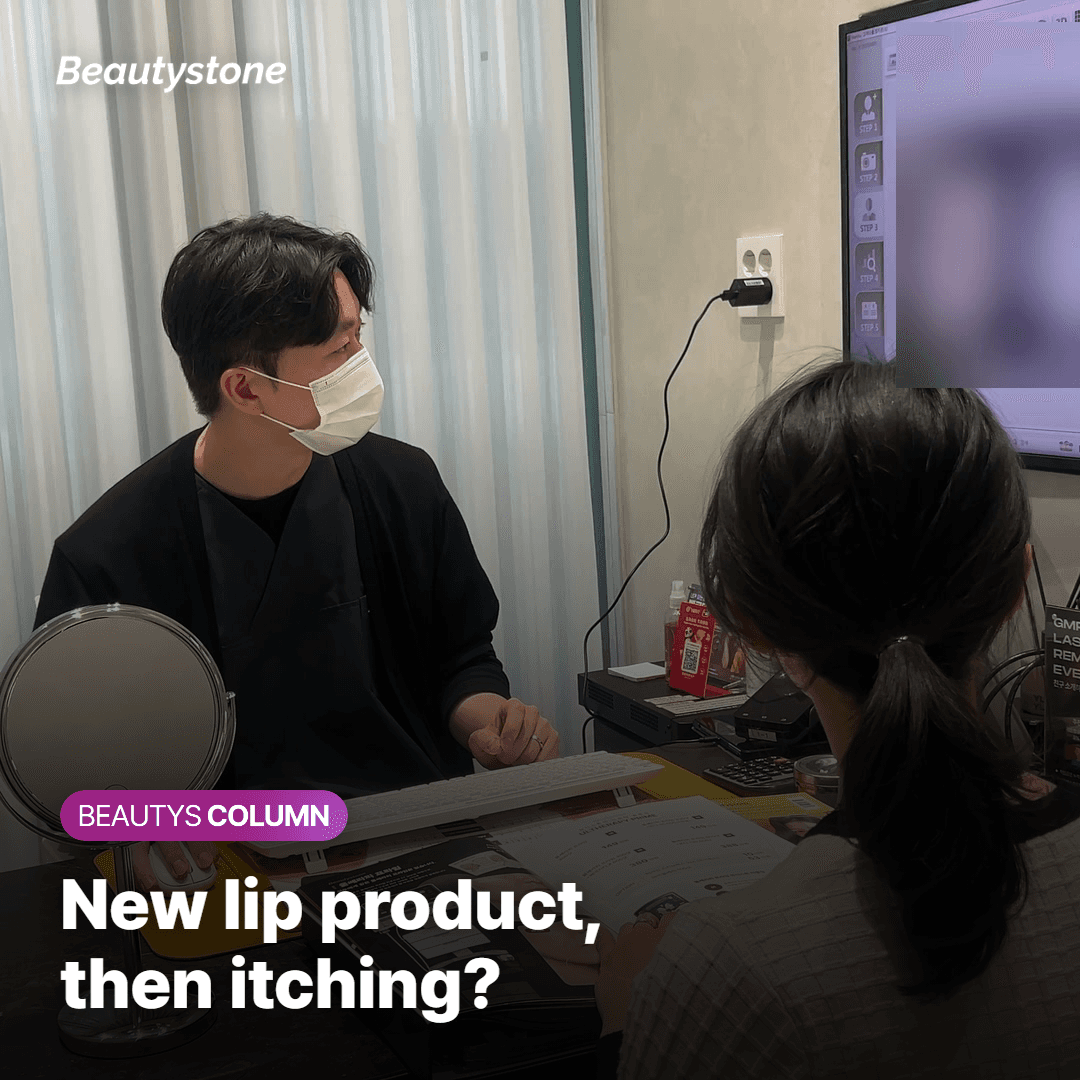 Doctor holding a laser handpiece near a patient's lips during a session
